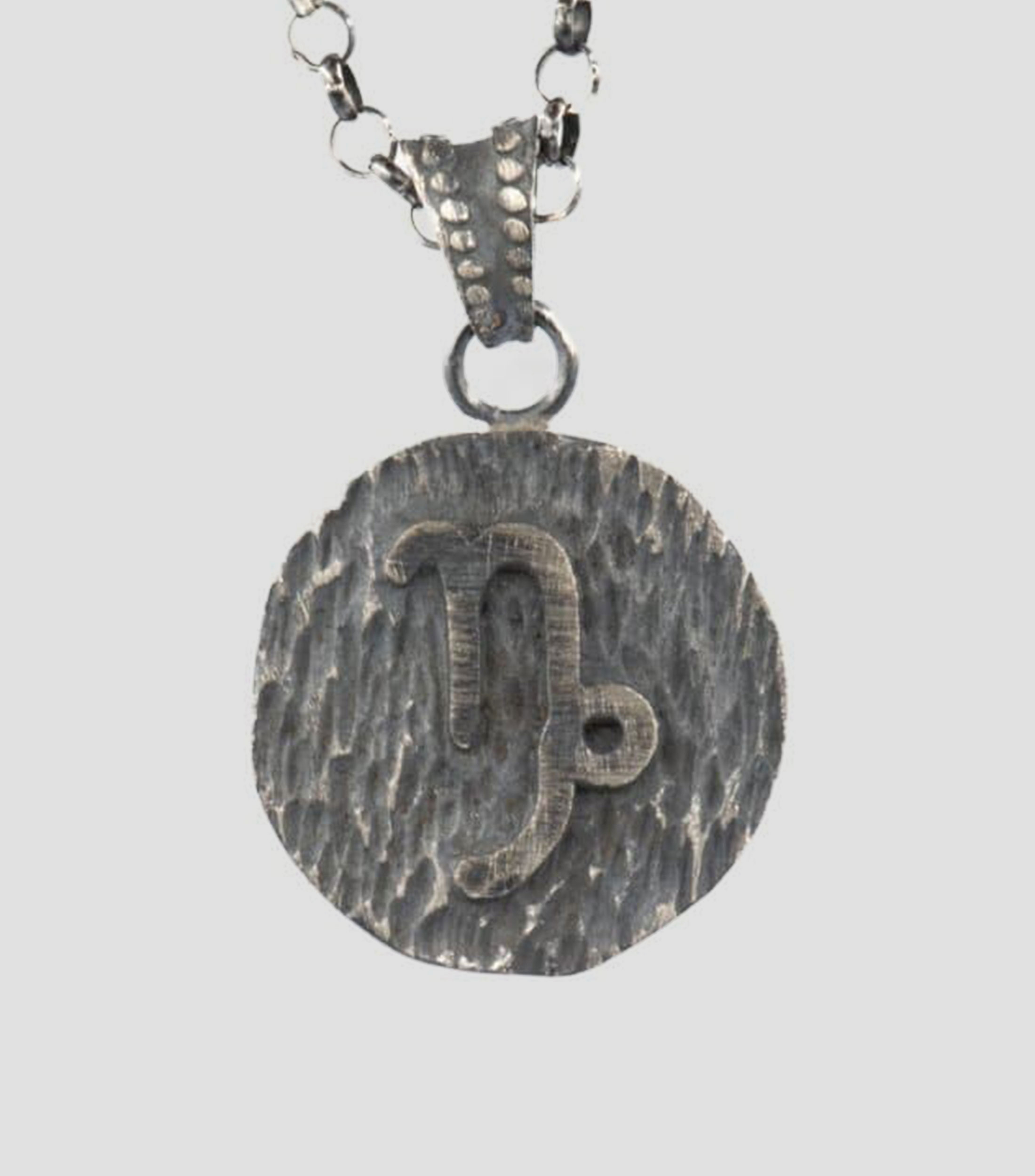 Dije en plata .925 signo zodiacal Capricornio Unisex