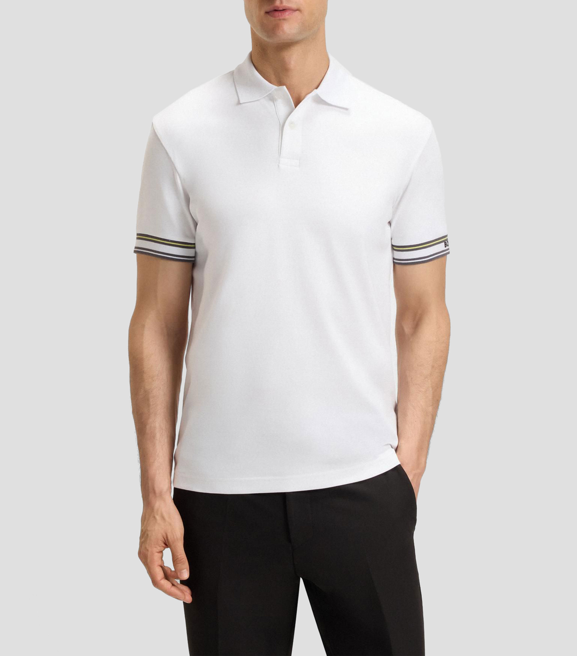Polo slim fit de algodón con puños a rayas Hombre