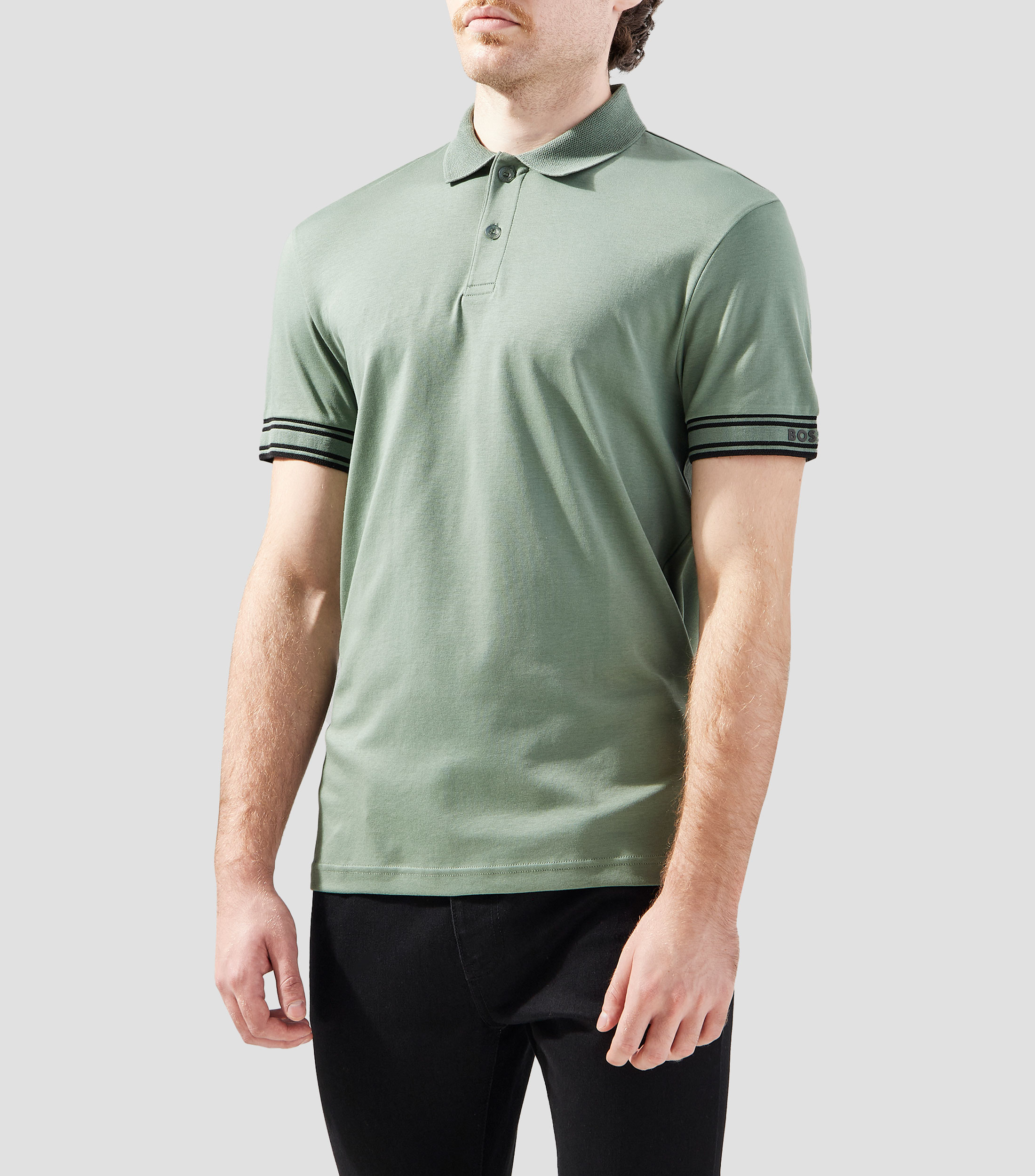 Polo slim fit de algodón con puños a rayas Hombre