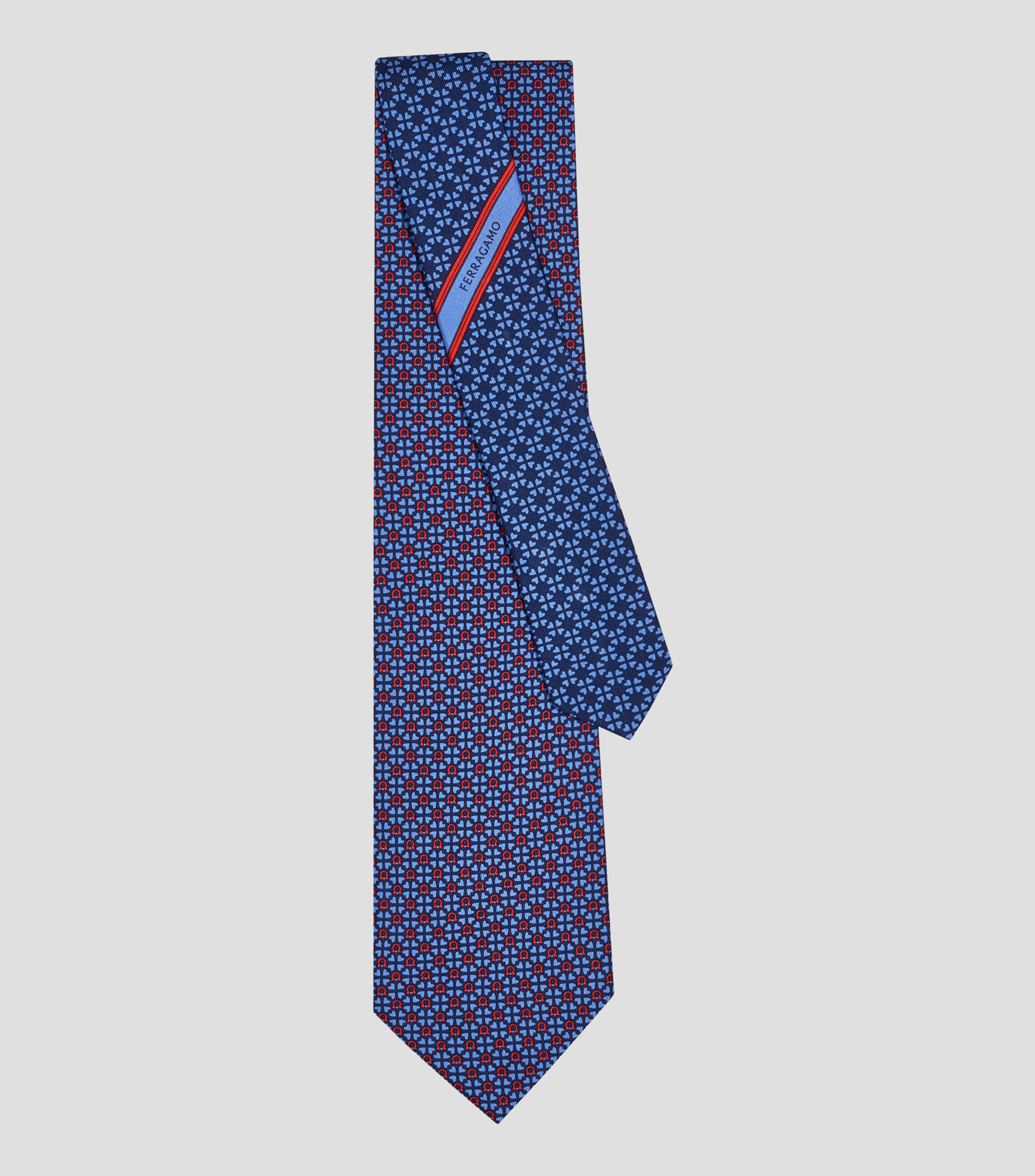 Corbata de seda estampado Gancini y corazones