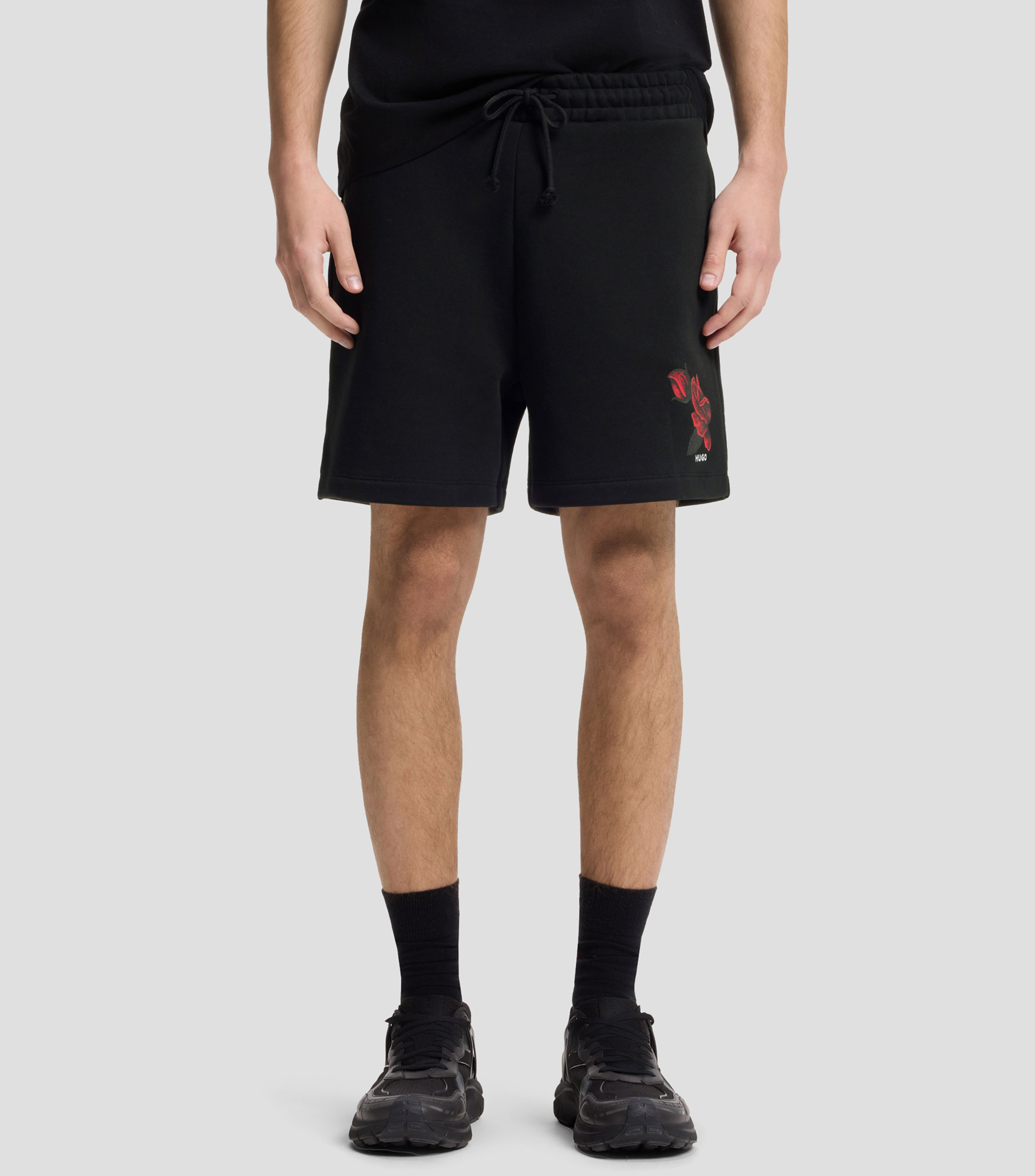 Short de felpa de algodón con ilustración de rosas Hombre