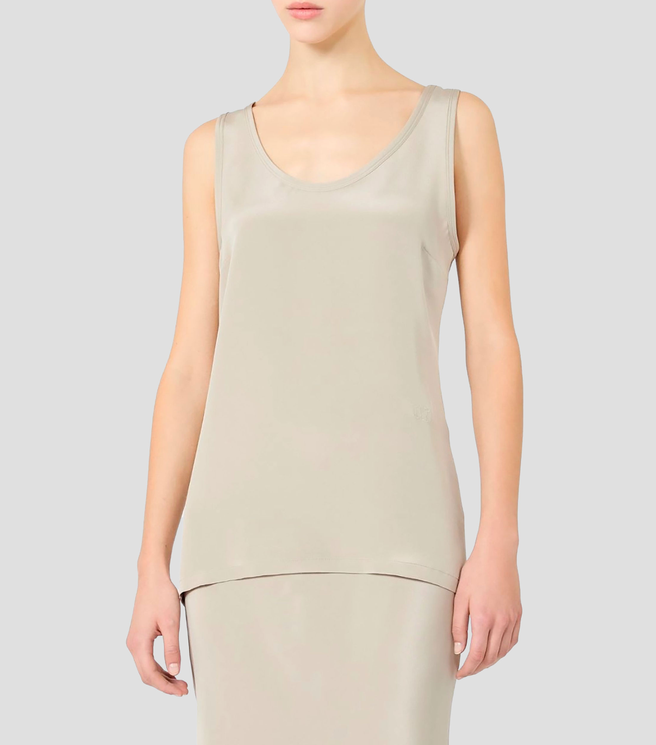 Blusa lisa sin mangas Mujer