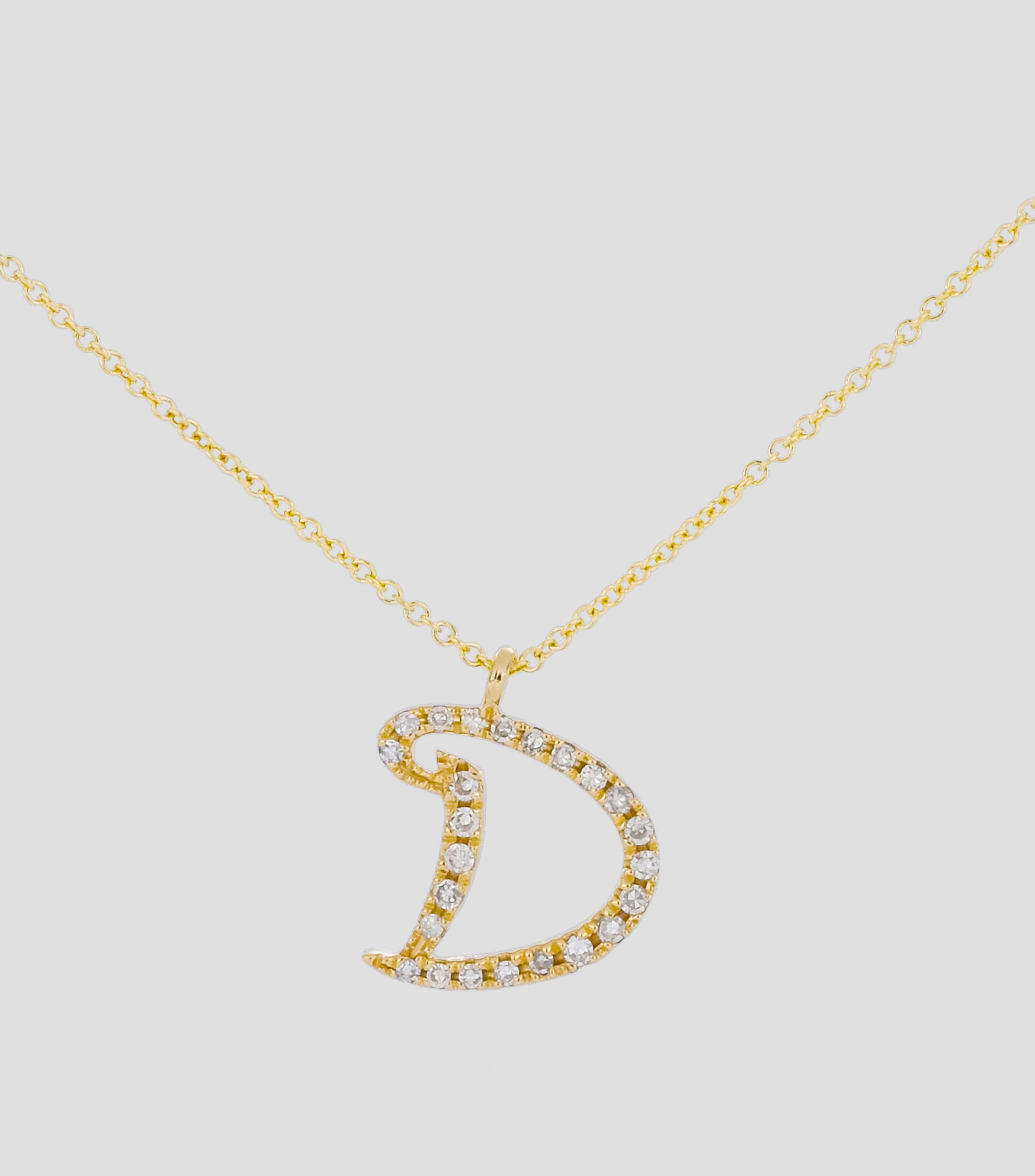 Dije en letra "D" y cadena en Oro amarillo 14 Kts Mujer