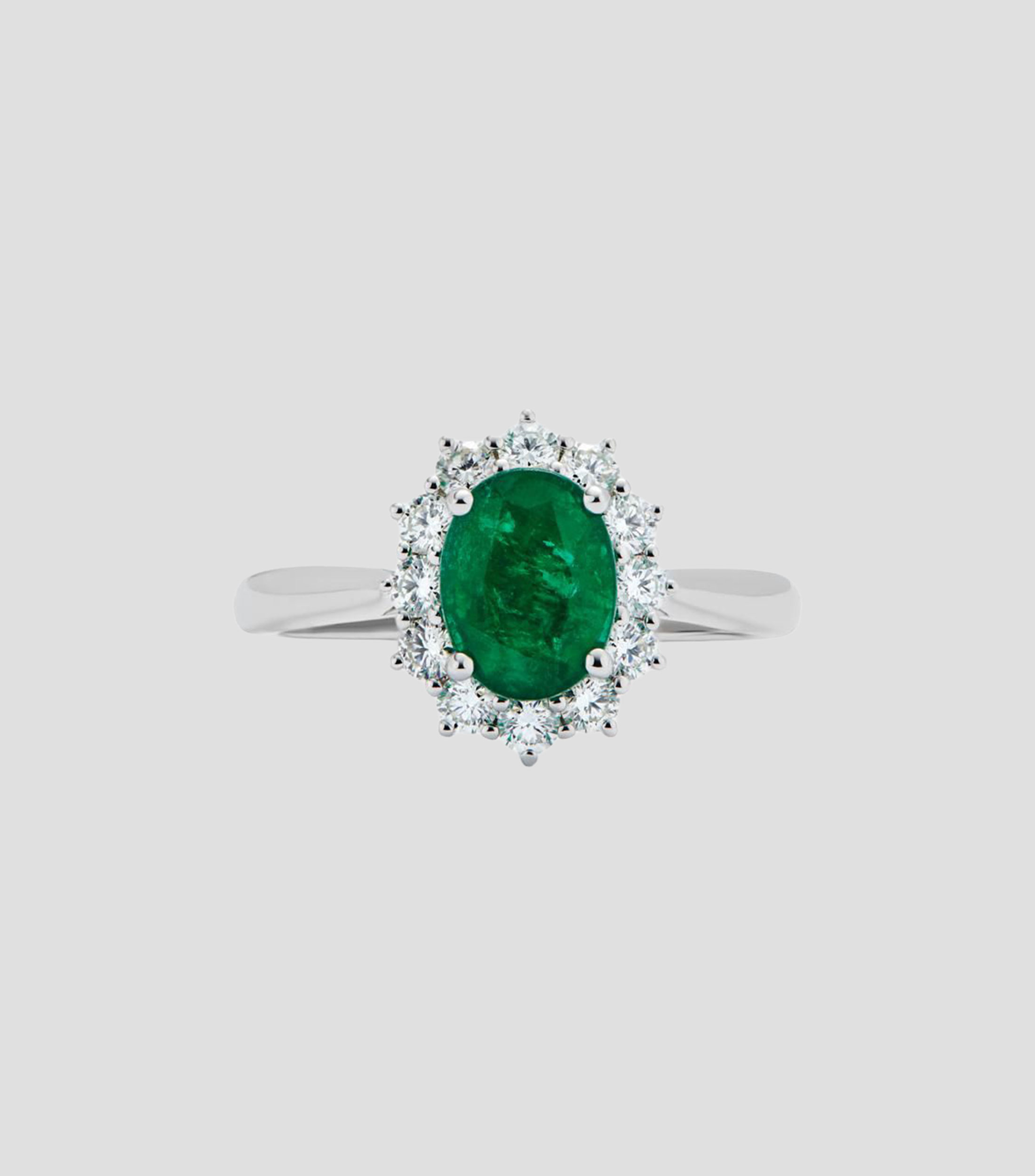 Anillo en Oro blanco de 18 Kilates con esmeralda y diamantes Mujer
