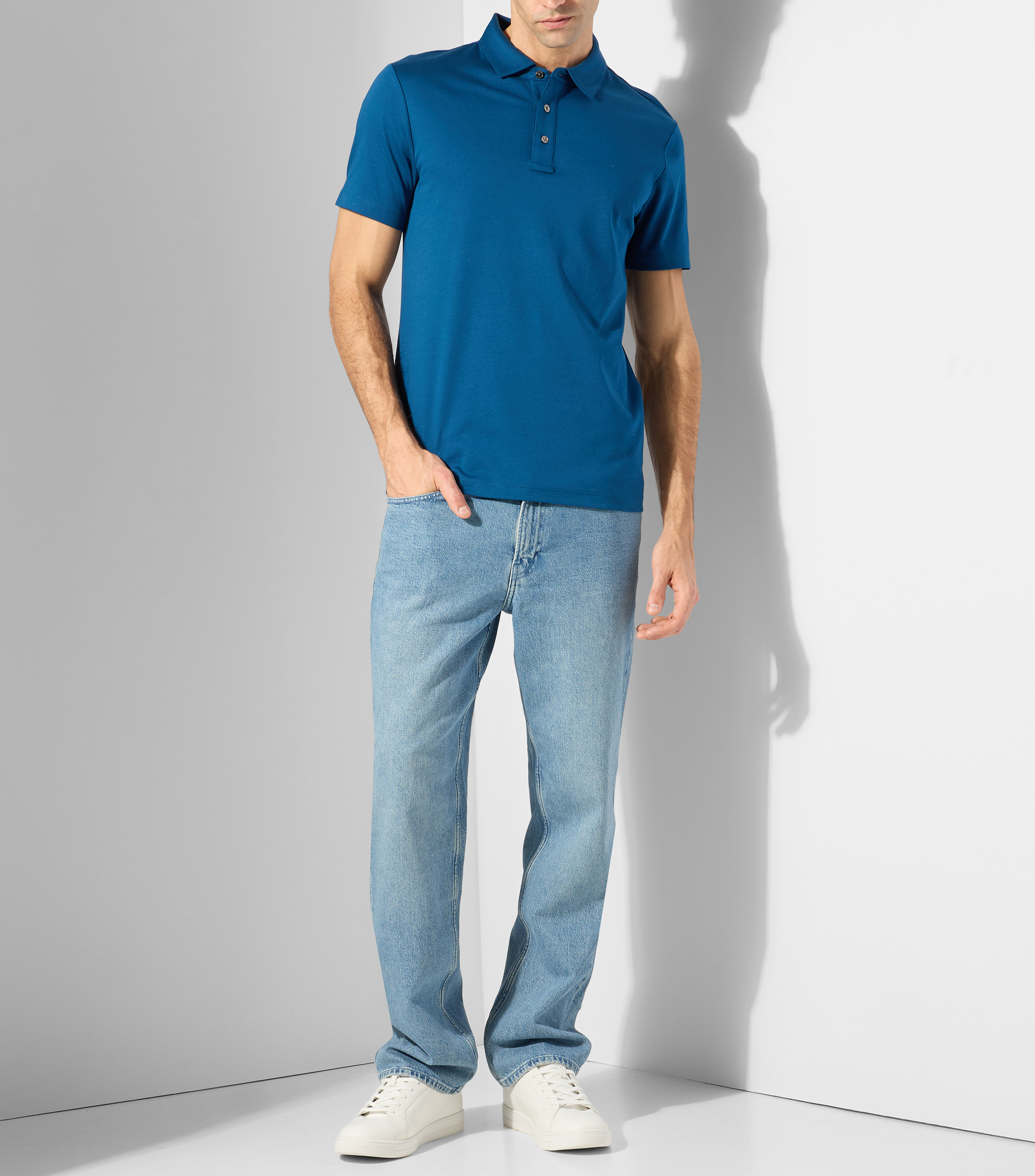 Playera tipo polo con manga corta lisa Hombre