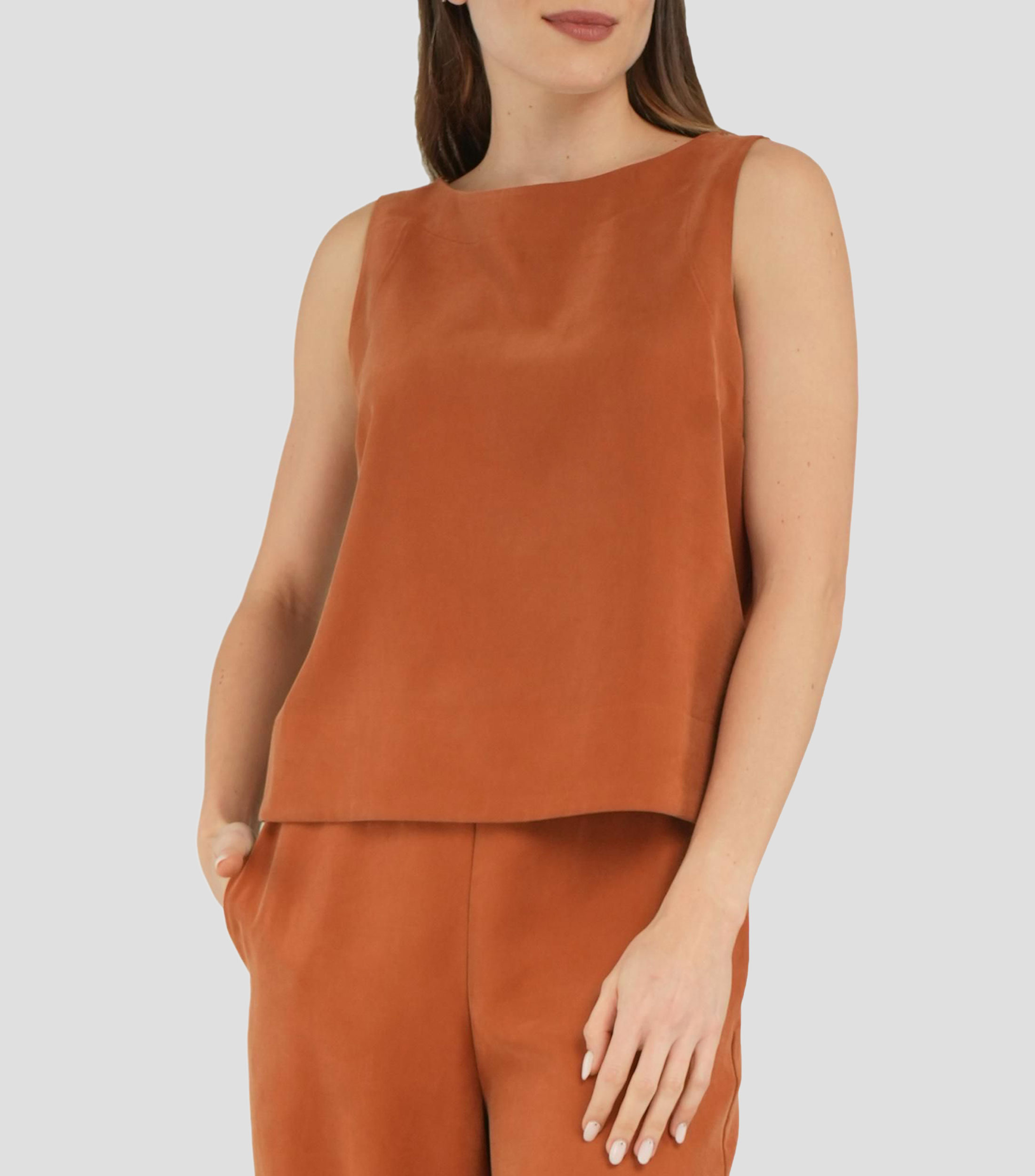 Blusa lisa sin mangas Mujer