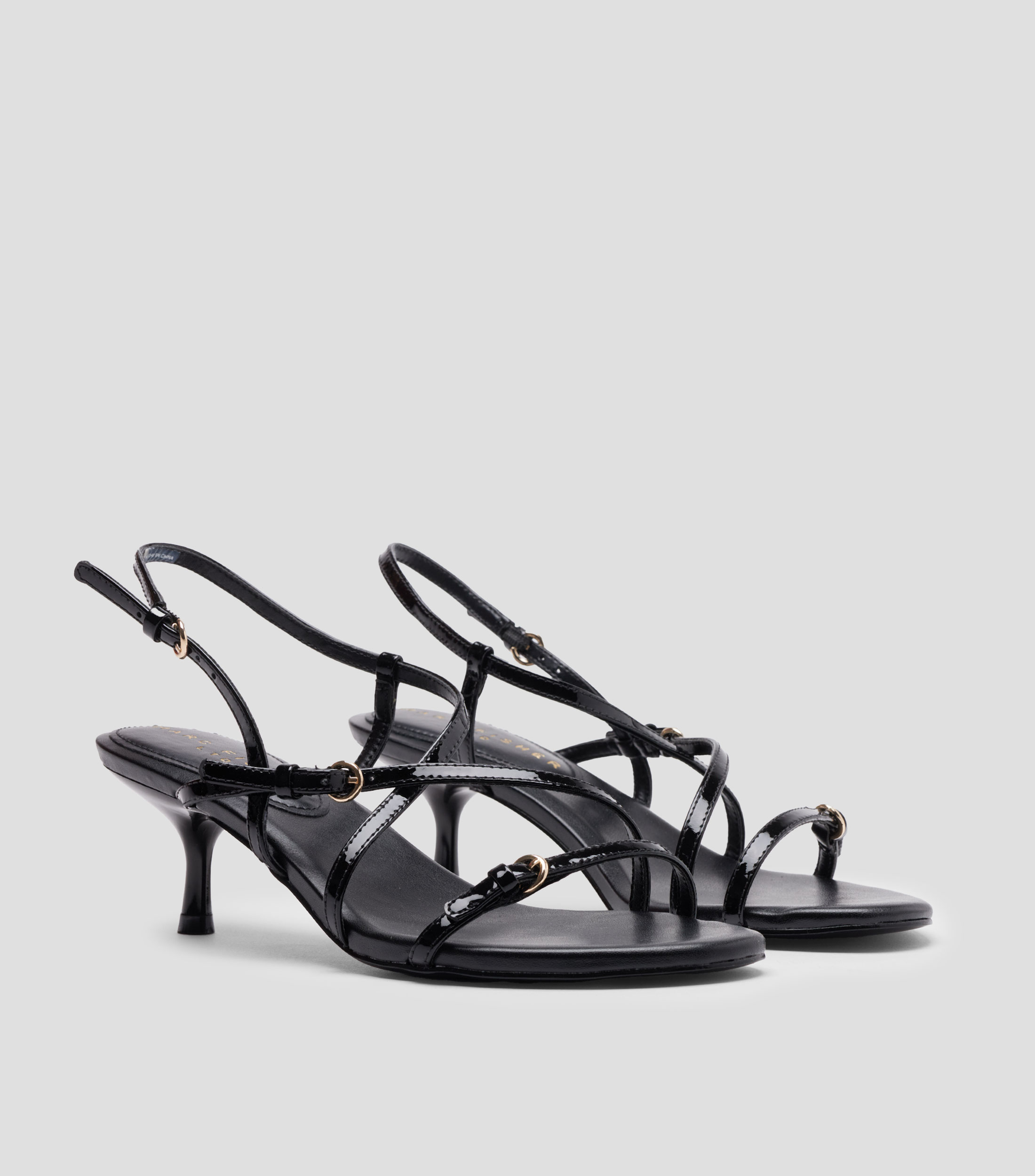 Sandalias con tacón bajo de aguja Mujer
