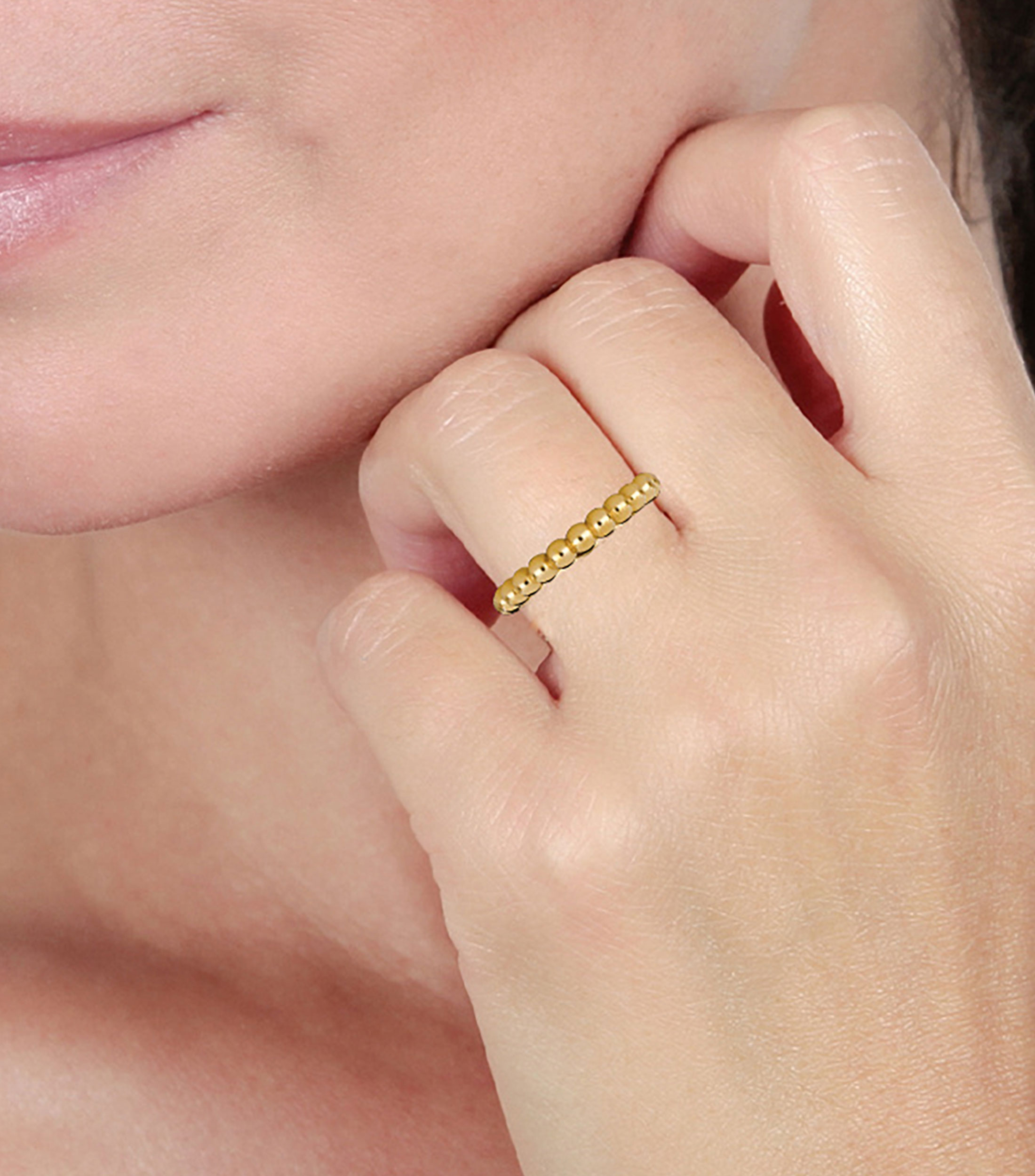 Anillo en oro amarillo 14 kilates con bolas Mujer