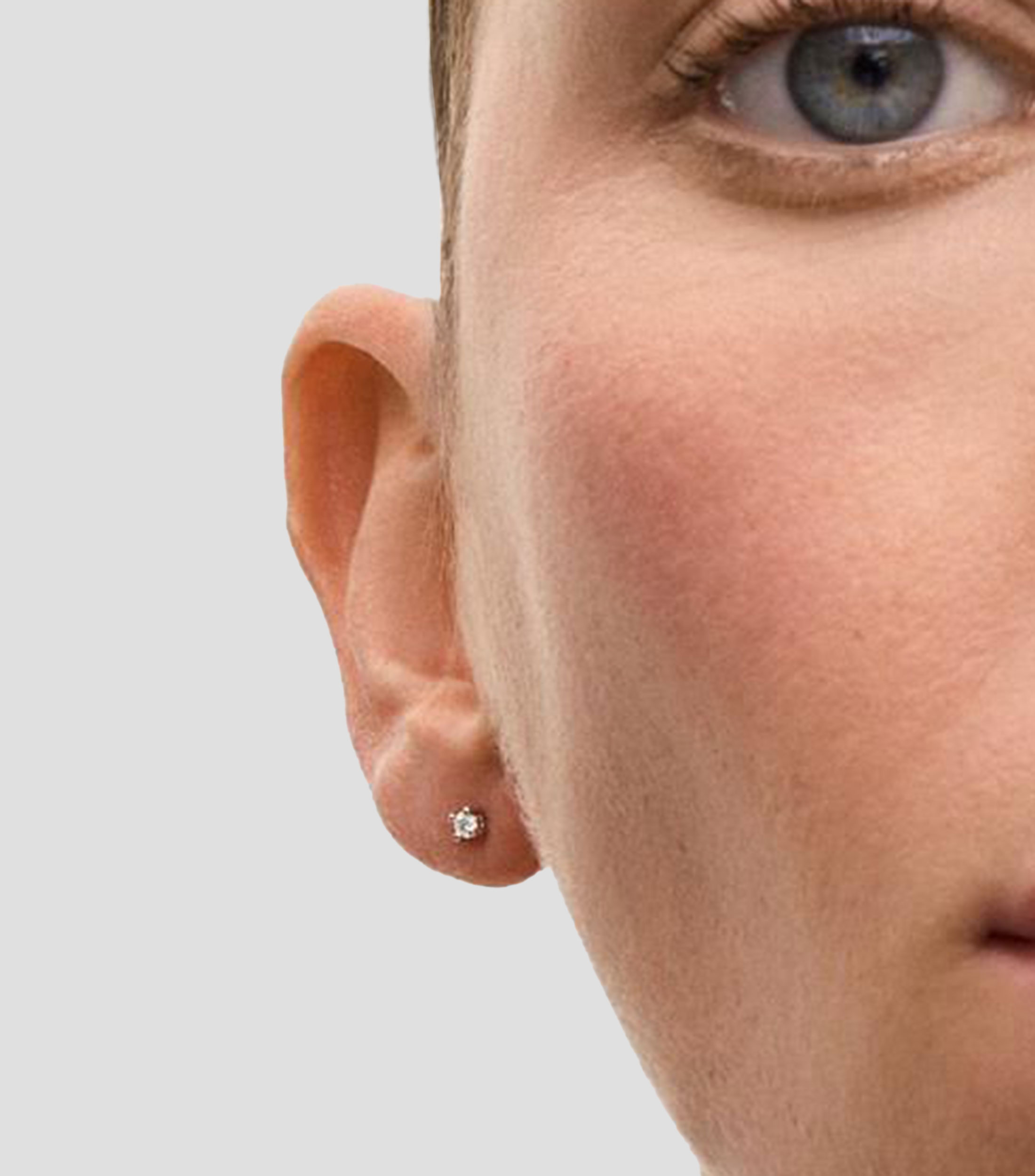Aretes solitarios en Oro blanco de 18 Kilates con 2 diamantes en talla brillante Mujer