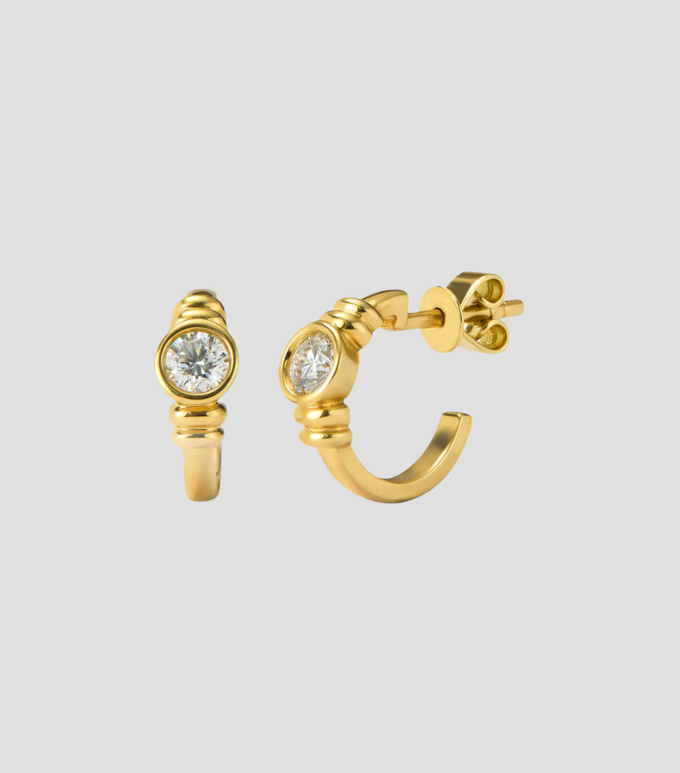 Aretes de aro en Oro amarillo de 18 Kilates con diamantes en talla brillante Mujer