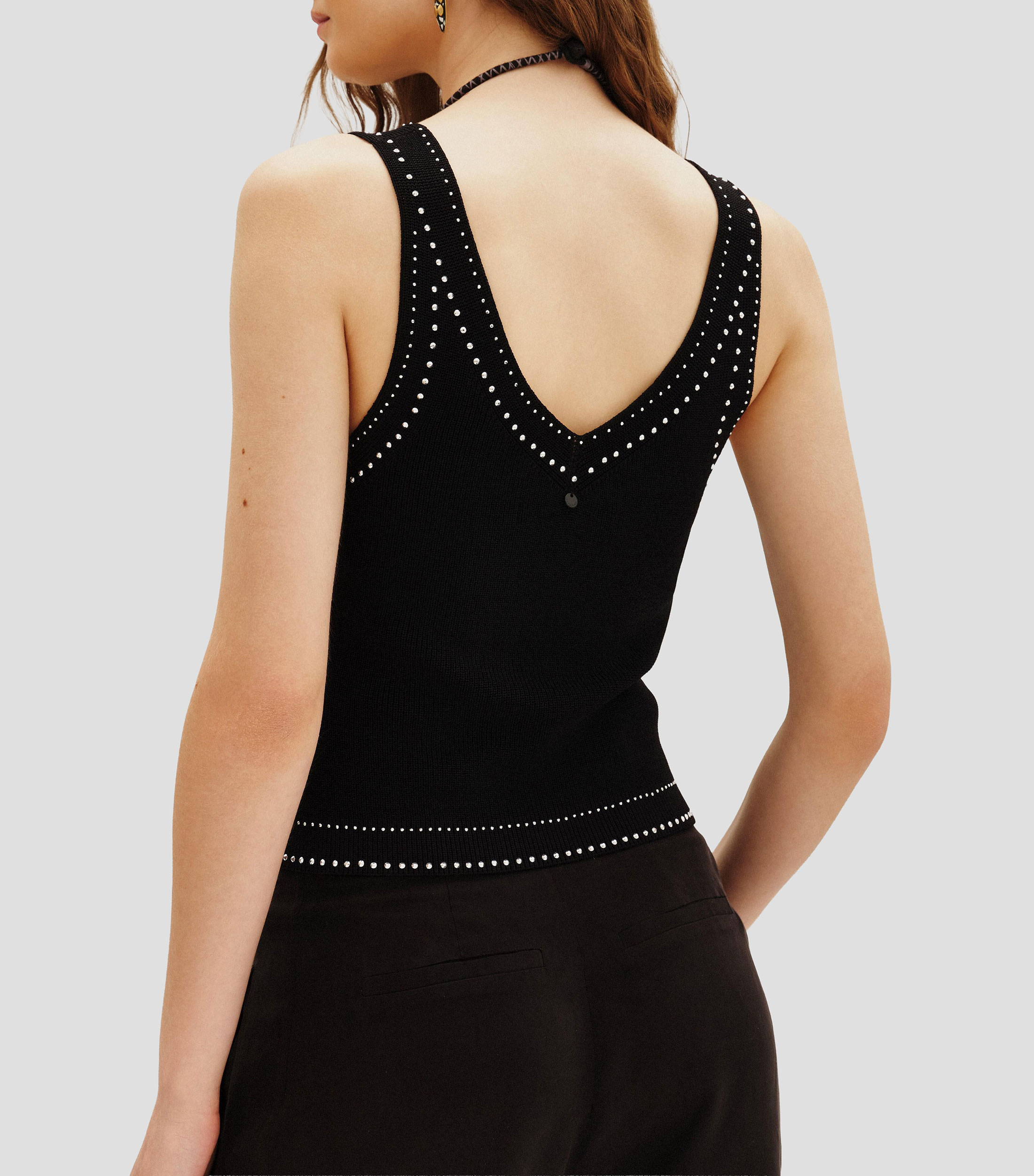 Blusa lisa sin mangas Mujer