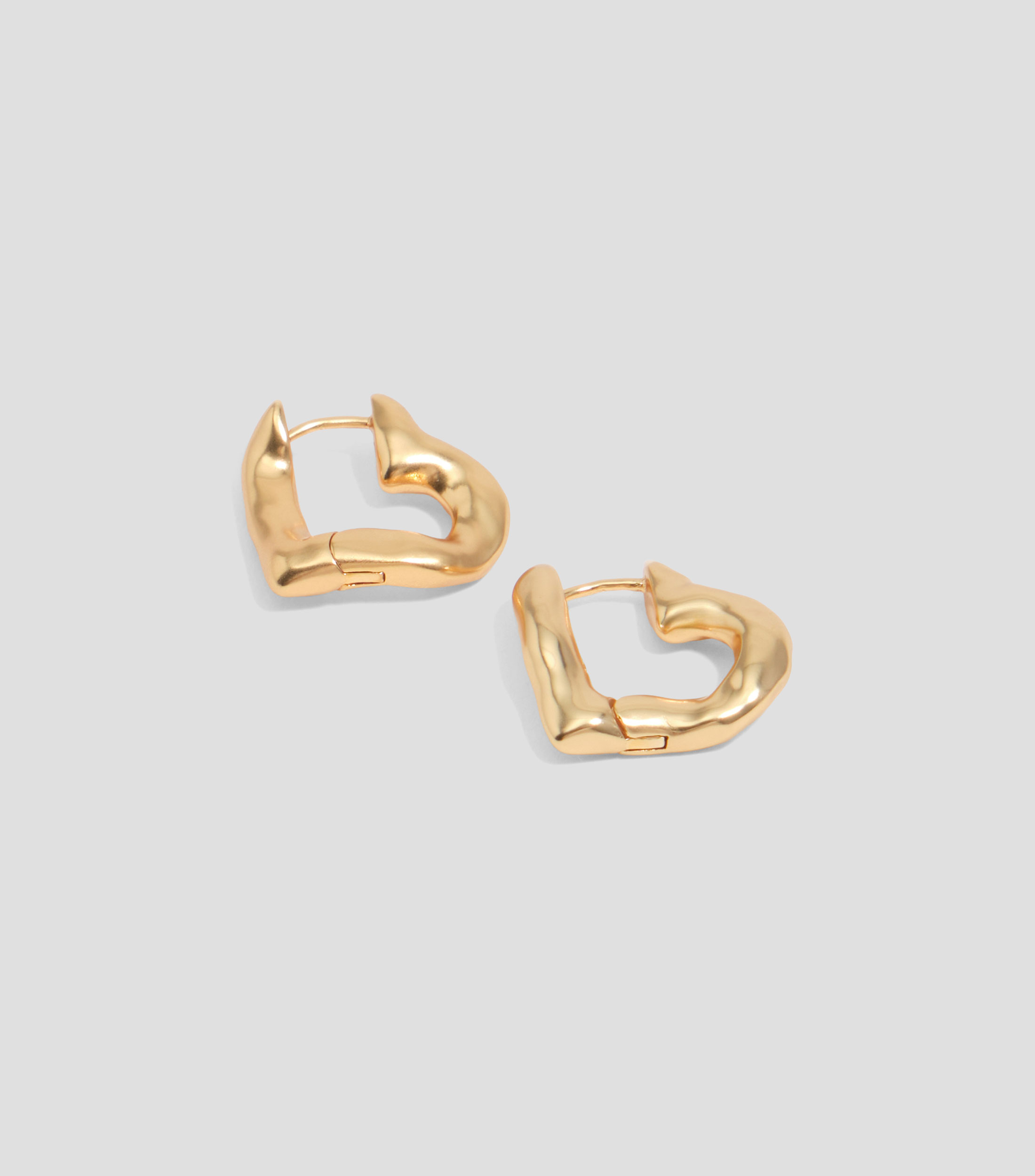 Pendientes aro corazón con textura Mujer