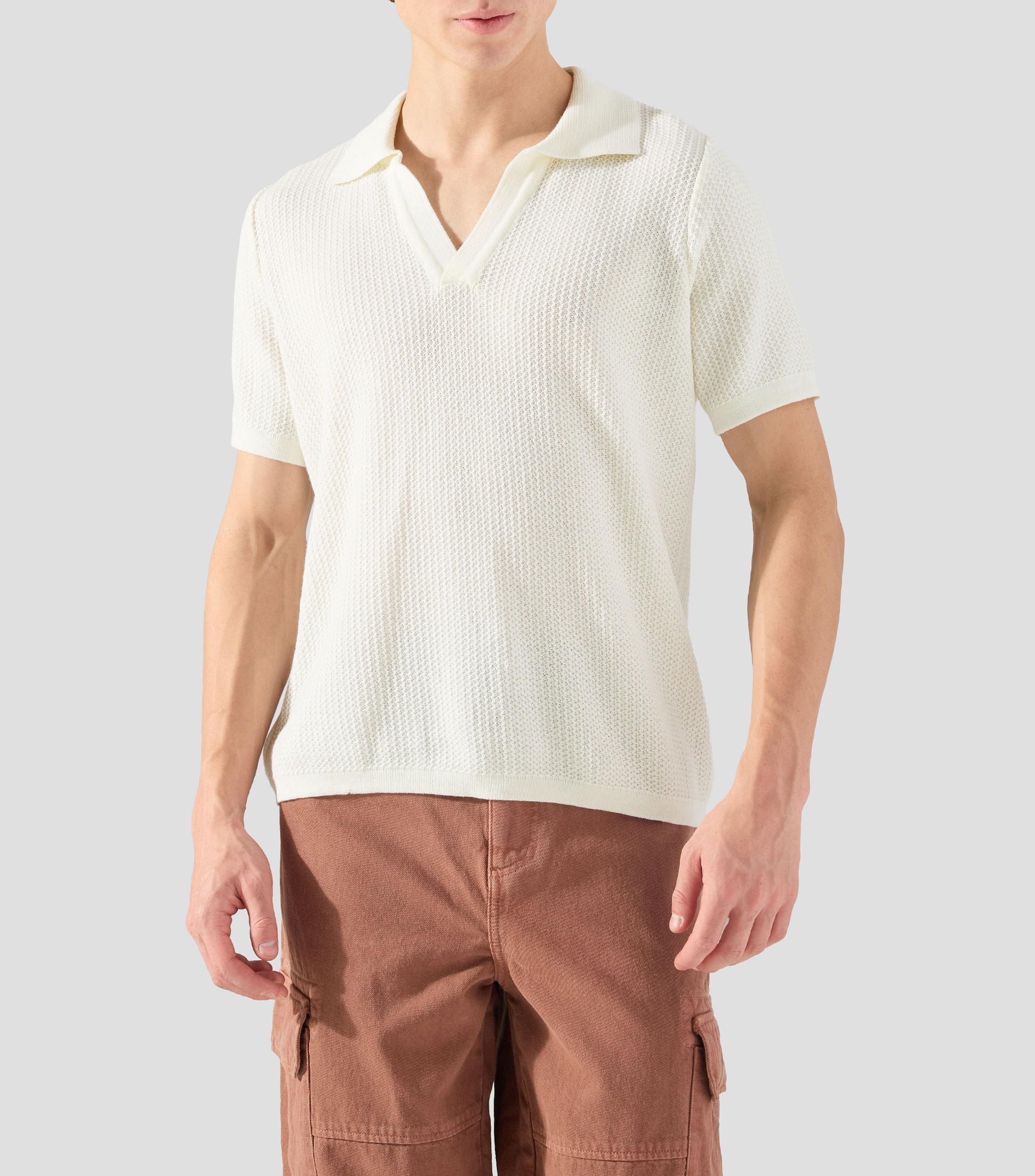 Playera tipo polo con manga corta lisa Hombre