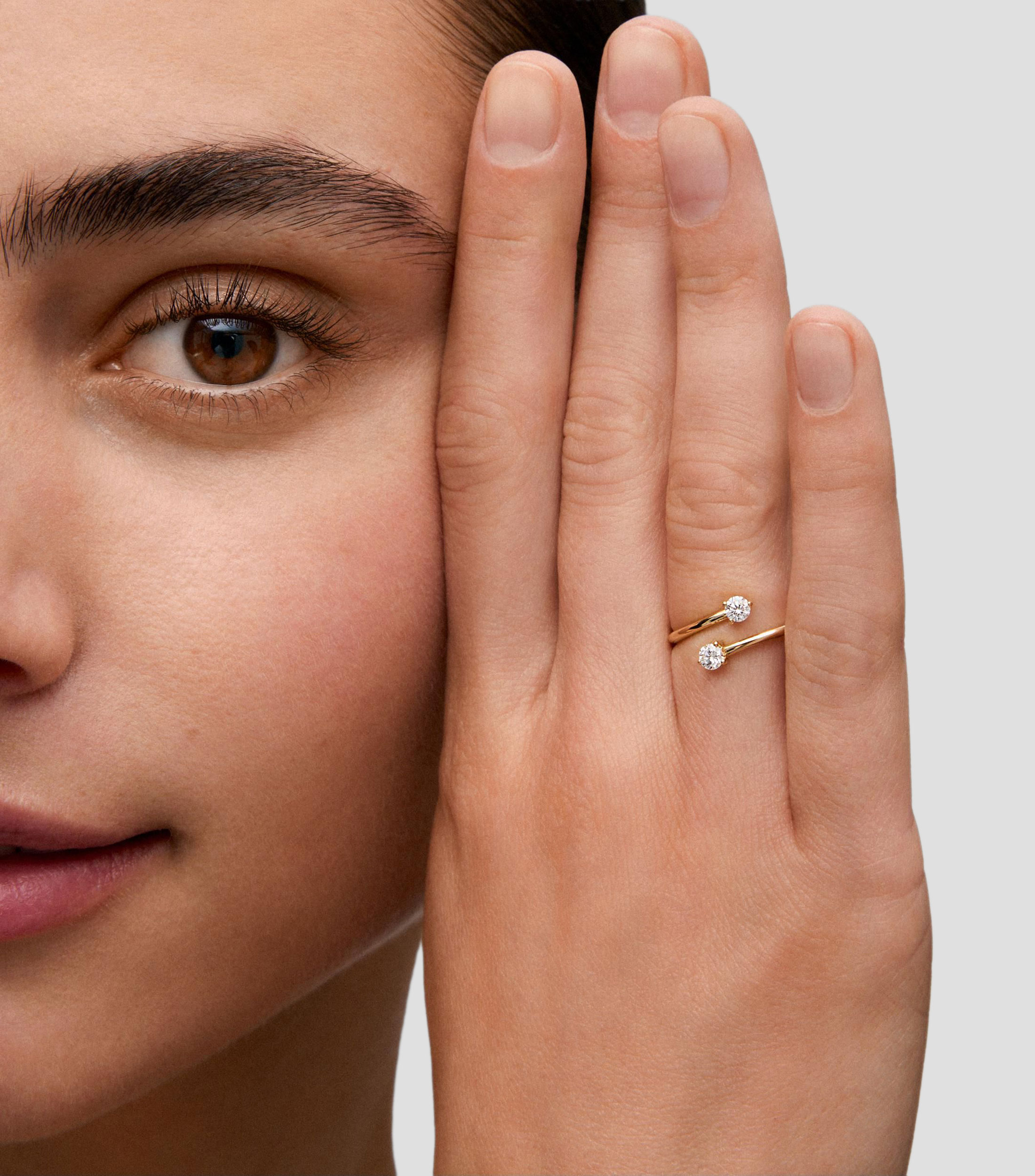Anillo tú y yo en Oro amarillo de 18 Kilates con 2 diamantes en talla brillante Mujer