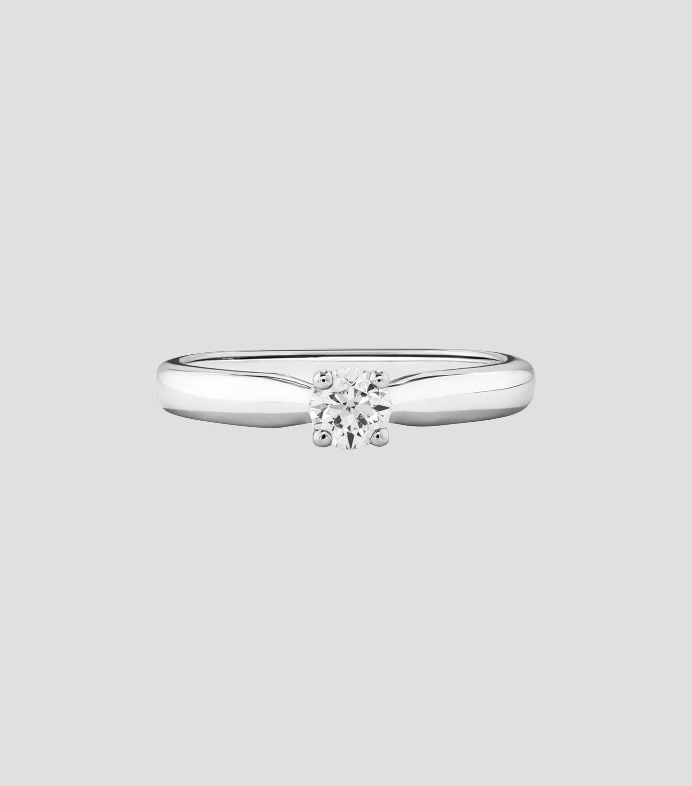 Anillo solitario en Oro blanco de 18 Kilates con diamante Mujer