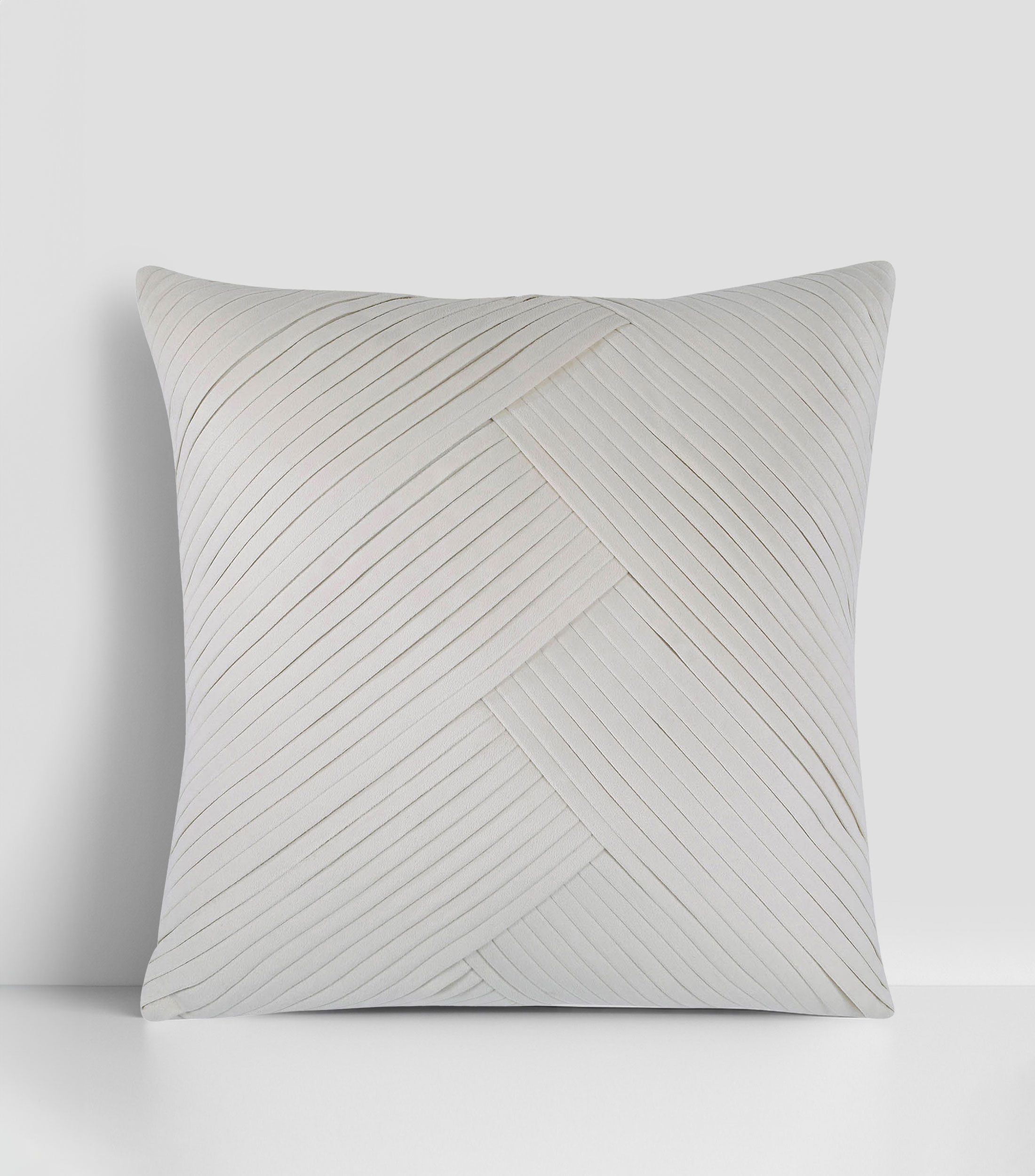 Cojin decorativo con lineas texturizadas
