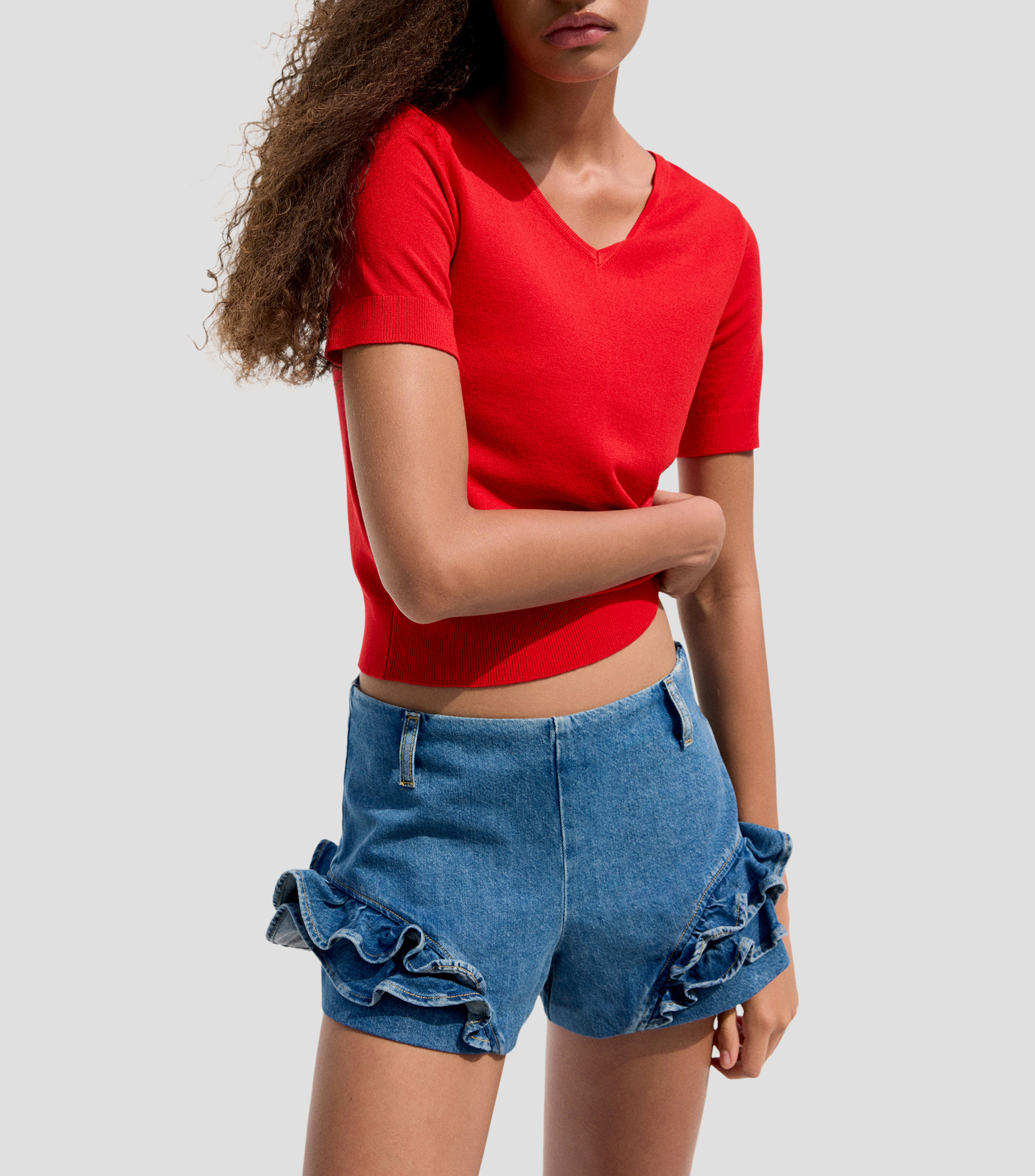 Suéter cuello V Mujer