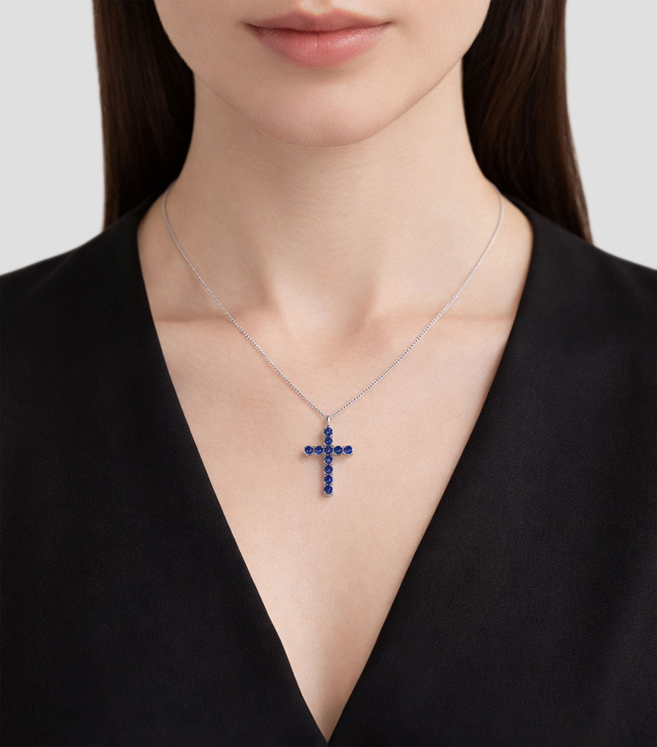 Collar cruz en oro blanco de 18 Kilates con zafiros Mujer