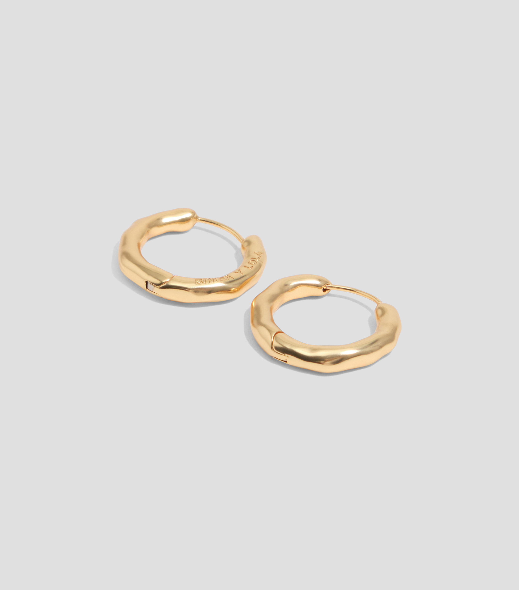 Pendientes aro irregular Mujer