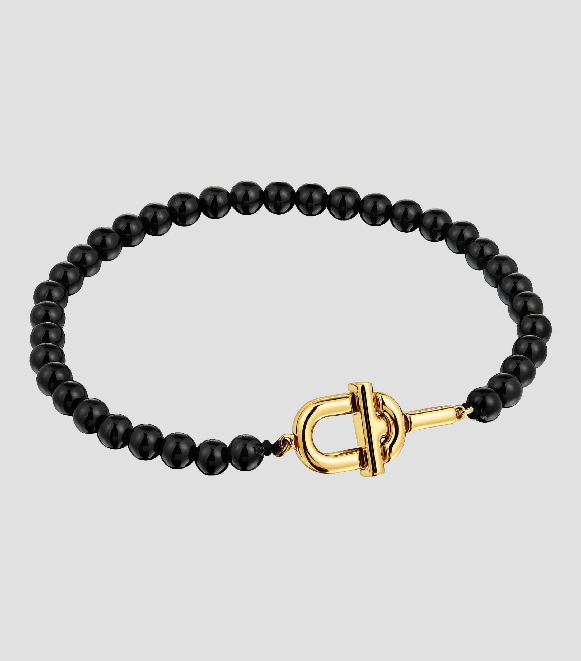 Pulsera con ónix y detalle de letras Mujer