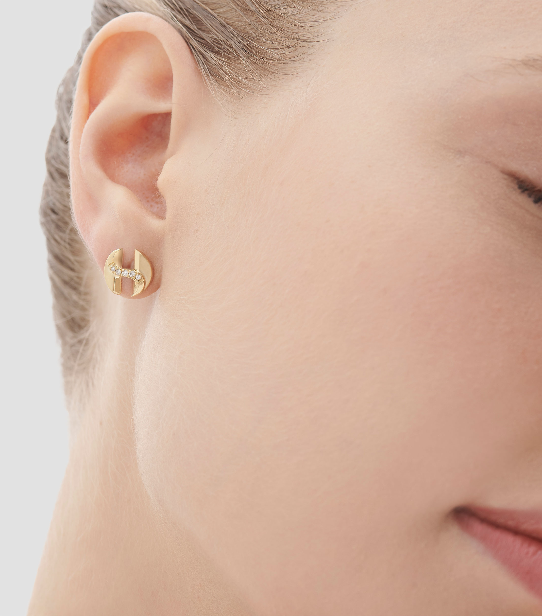 Aretes en oro amarillo de 18 kilates con diamantes Mujer