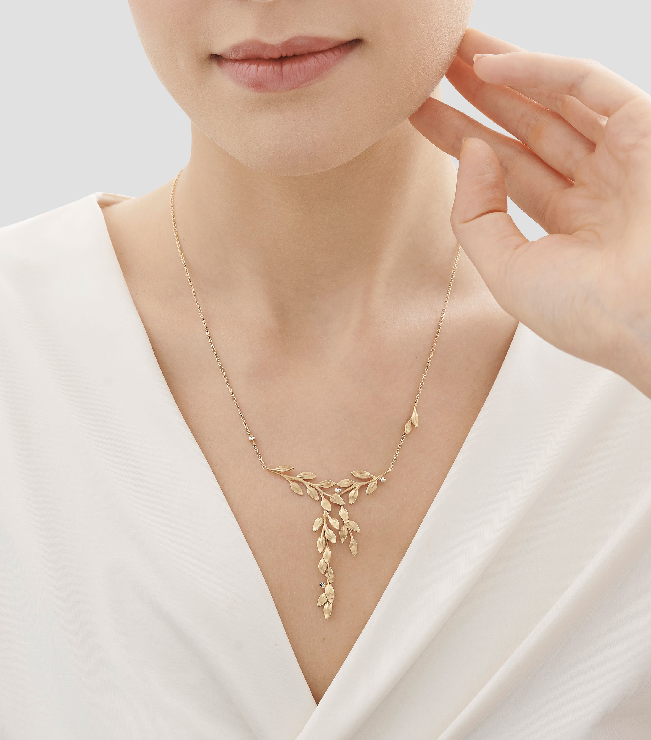 Collar Hojas de laurel en Oro amarillo de 18 Kilates con diamante Mujer
