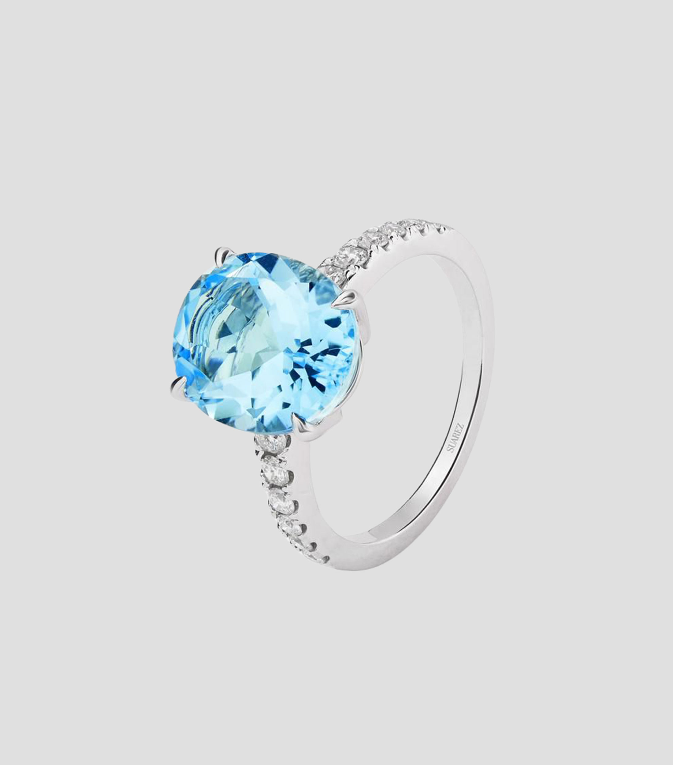 Anillo en oro blanco de 18 kilates con topacio y diamantes Mujer
