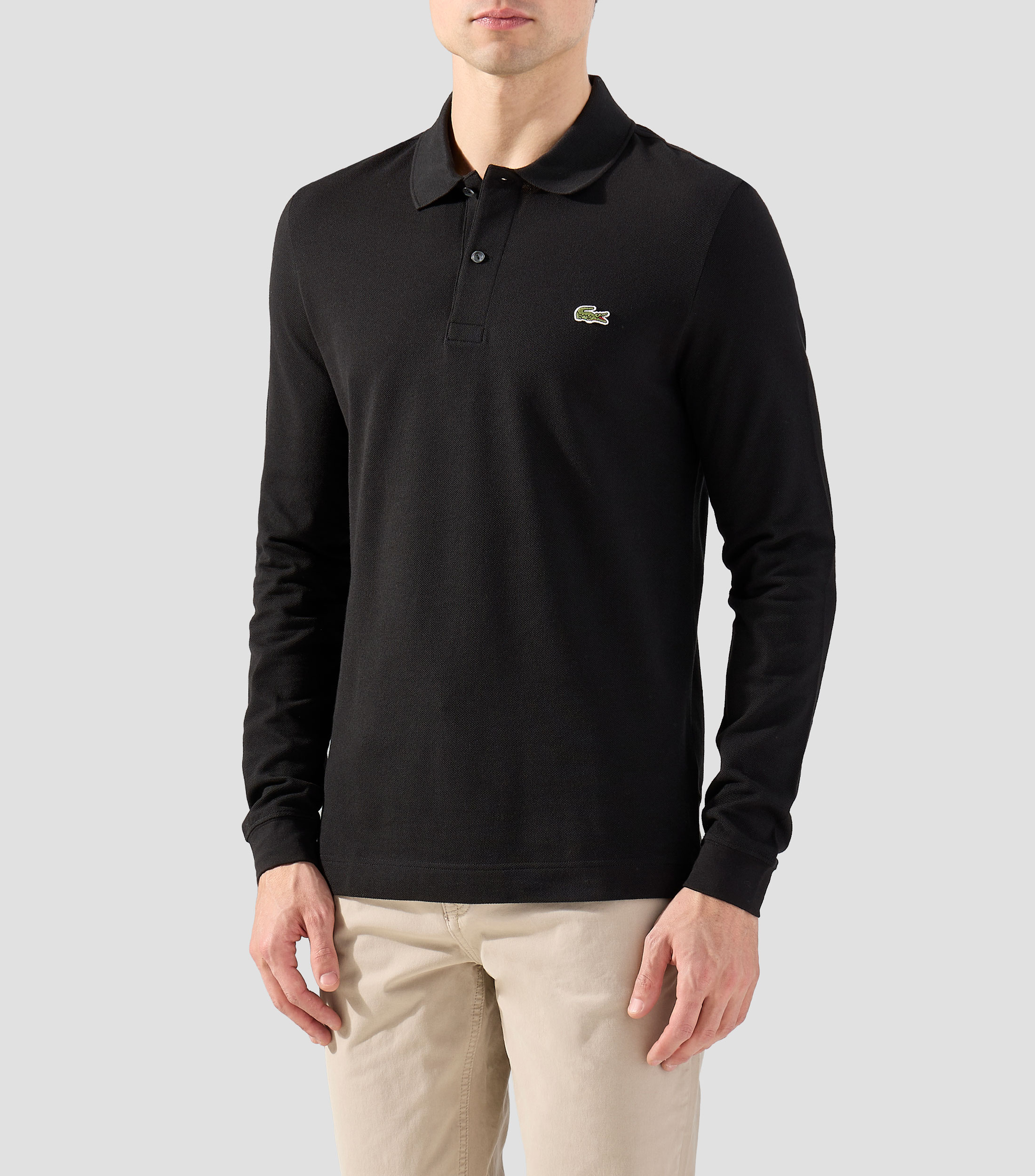 Playera tipo polo con manga larga lisa Hombre