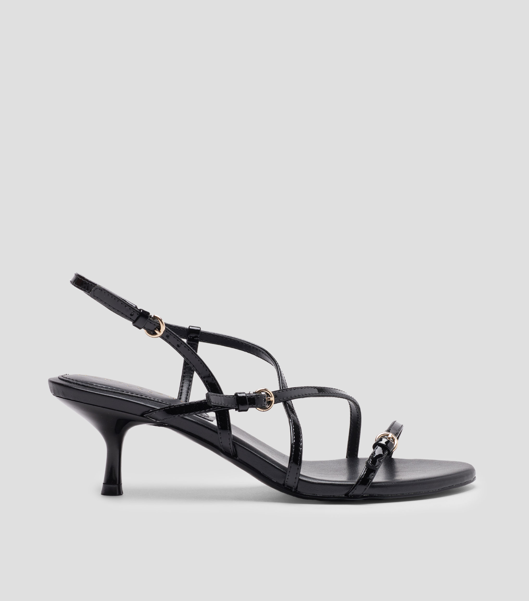Sandalias con tacón bajo de aguja Mujer