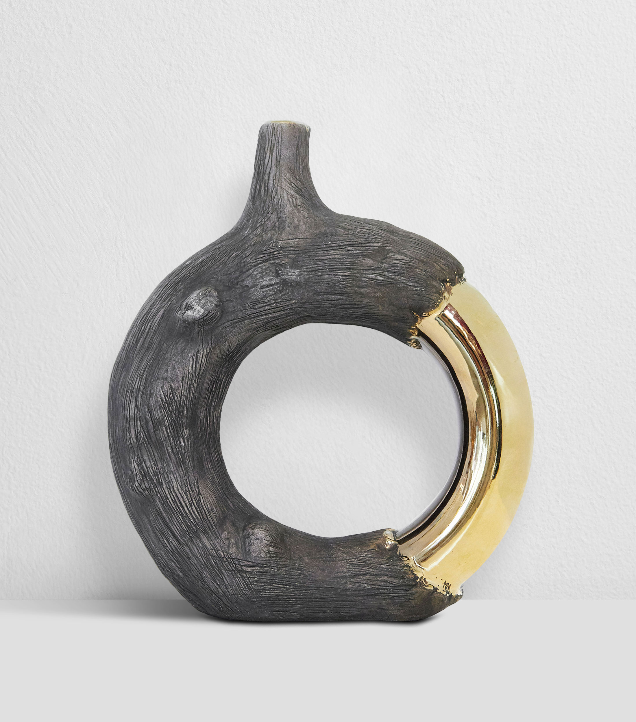 Figura decorativa circulo con detalle en relieve