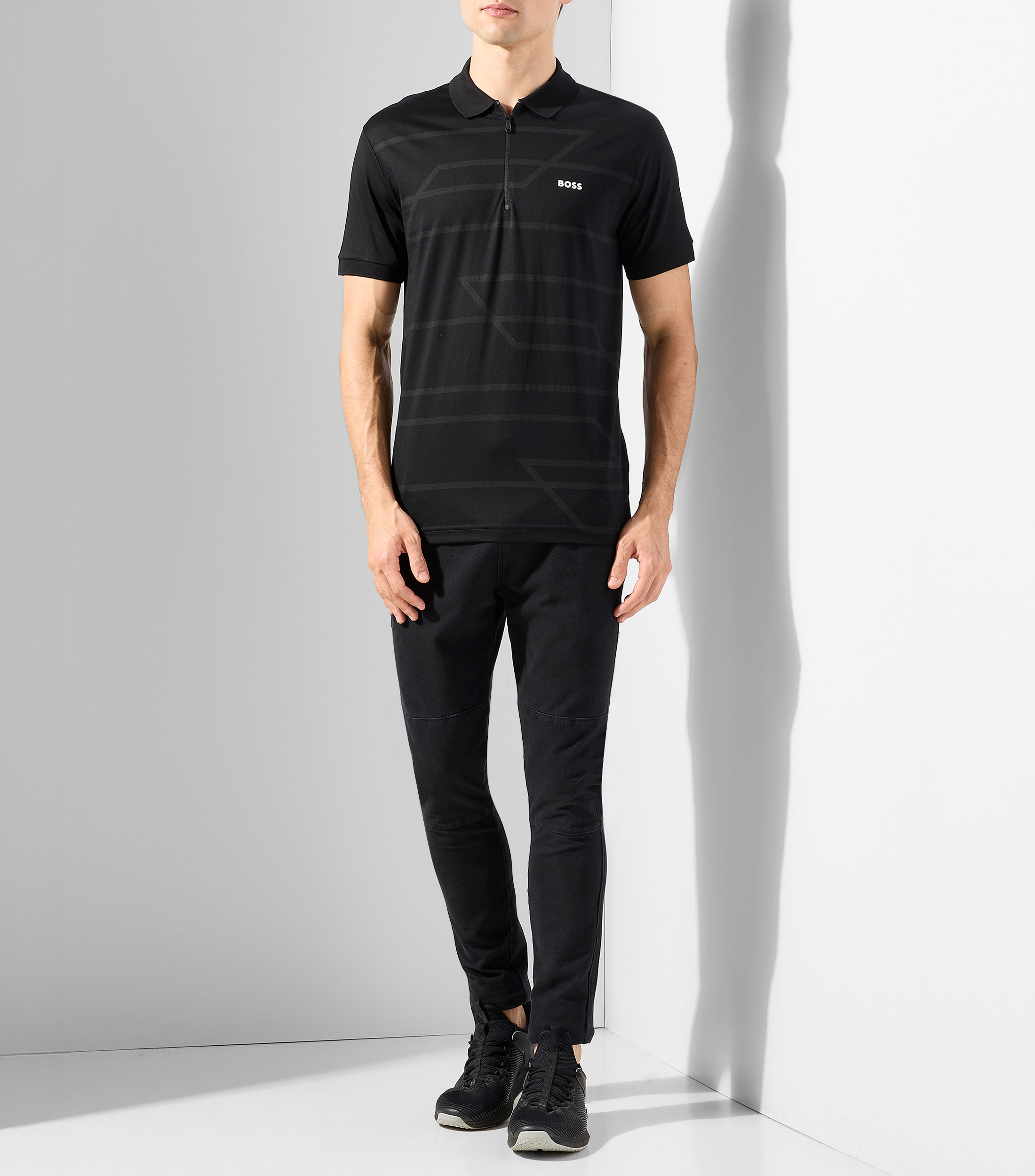 Playera tipo polo de manga corta estampada Hombre