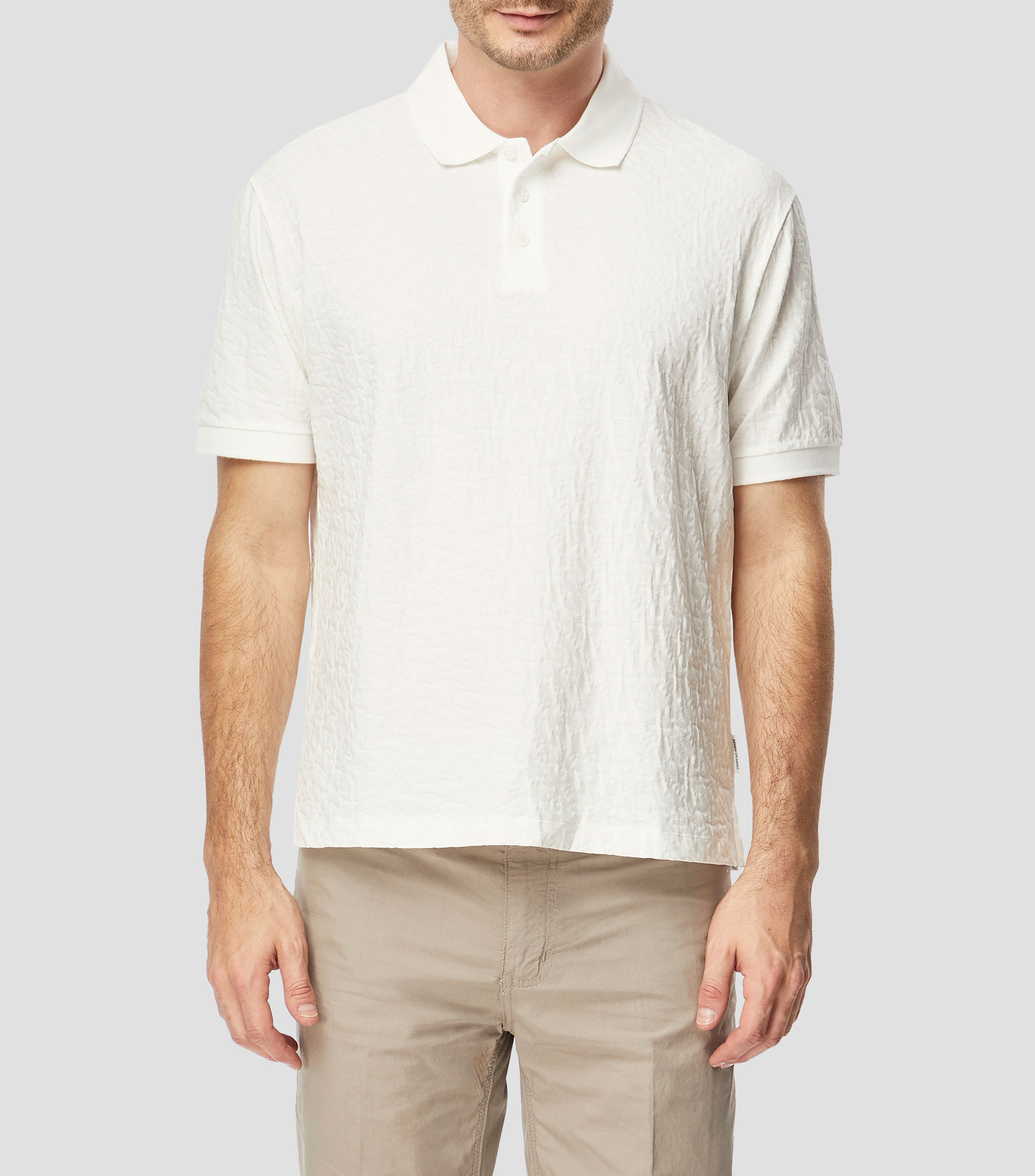 Playera tipo polo con manga corta lisa Hombre