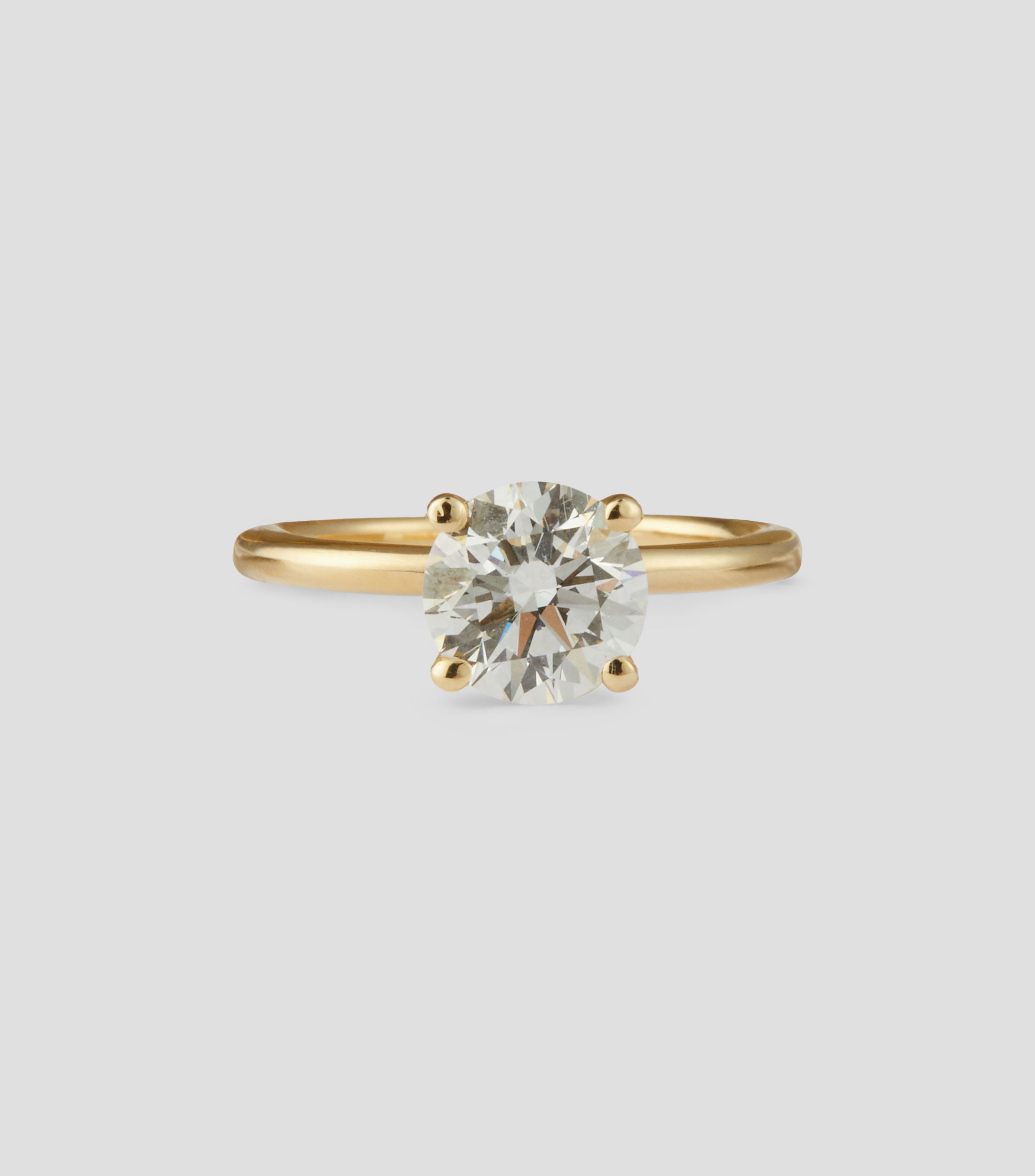 Anillo solitario en oro amarillo de 14 kilates con diamante Mujer