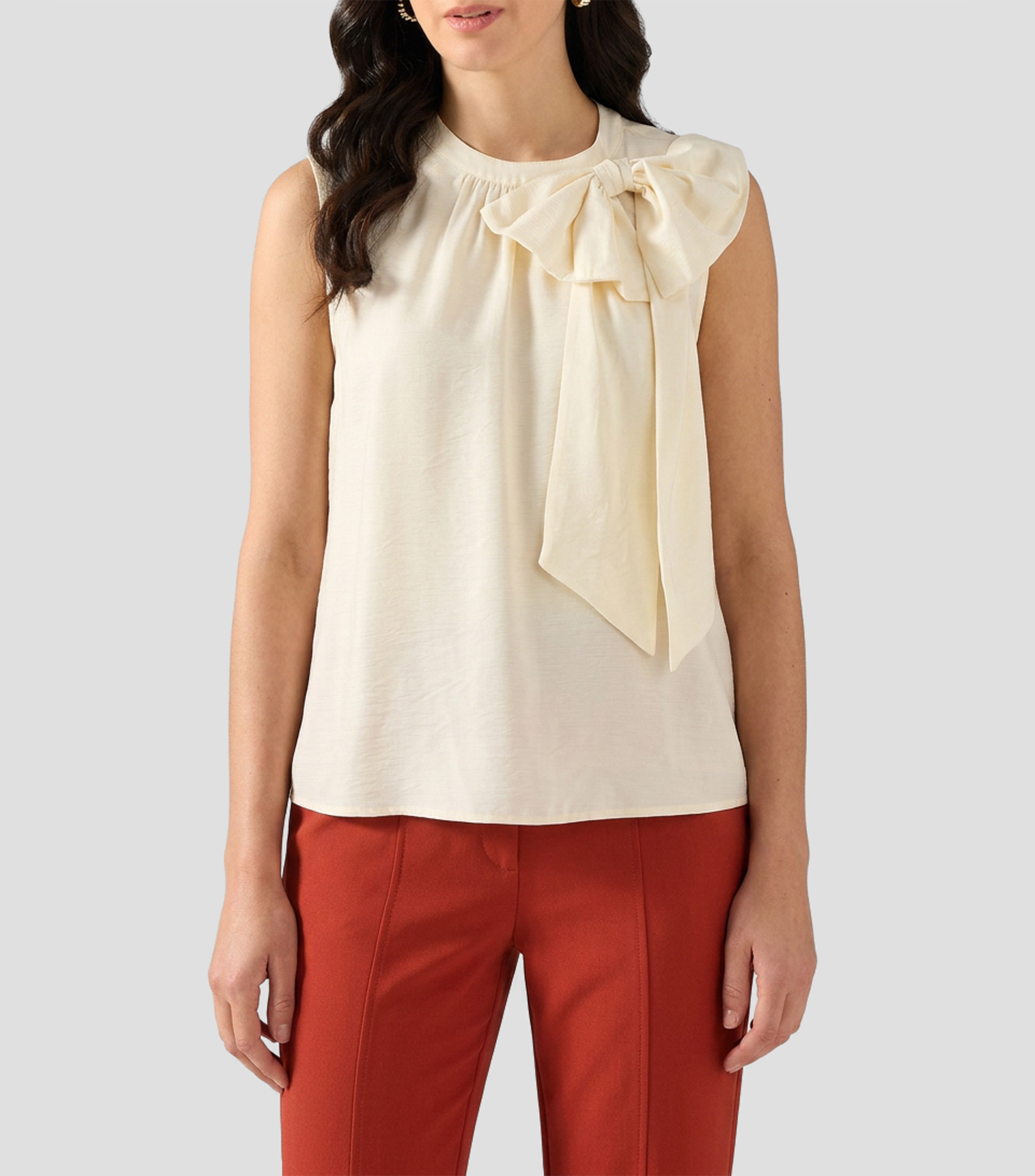 Blusa lisa sin mangas Mujer