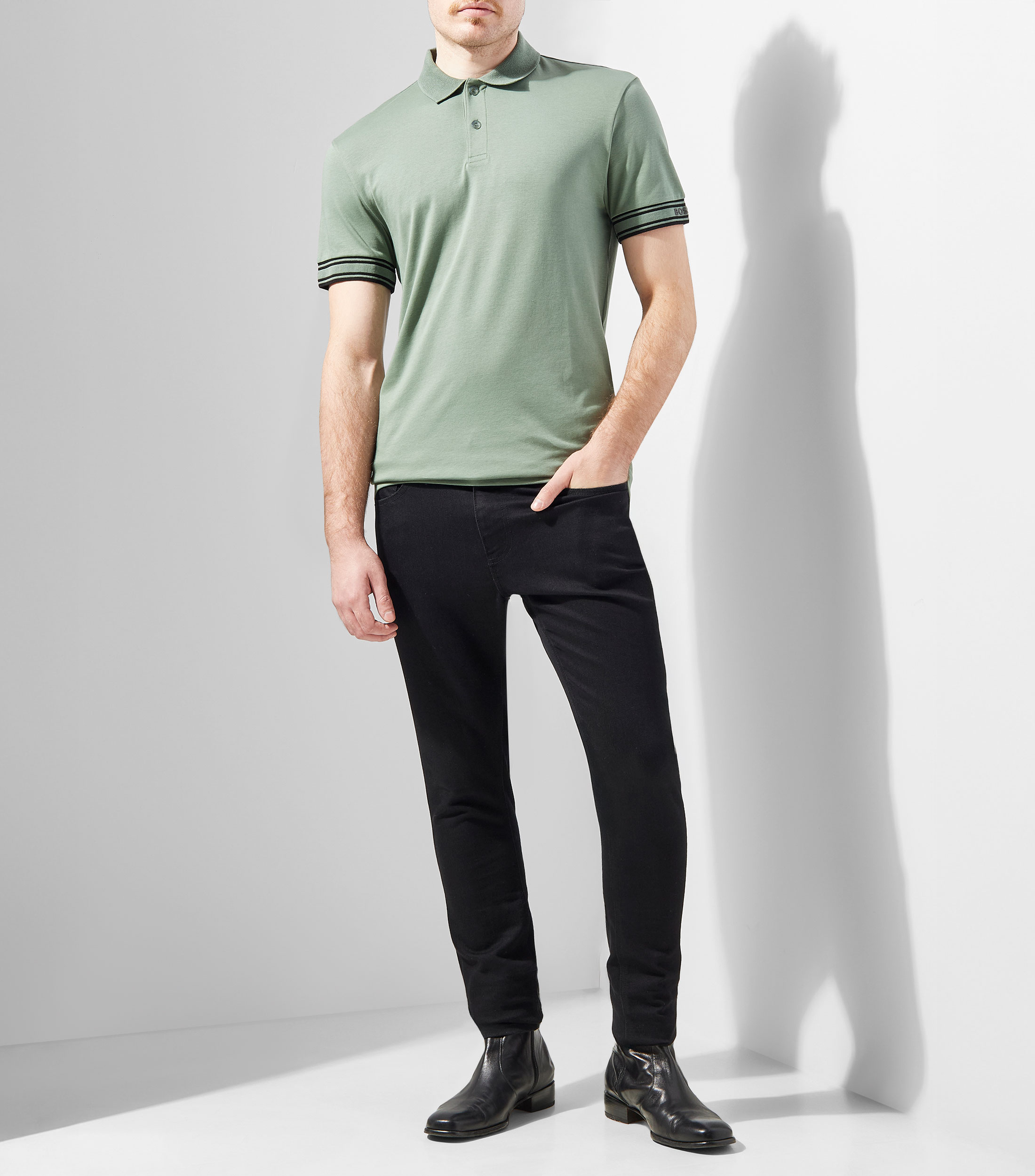 Polo slim fit de algodón con puños a rayas Hombre