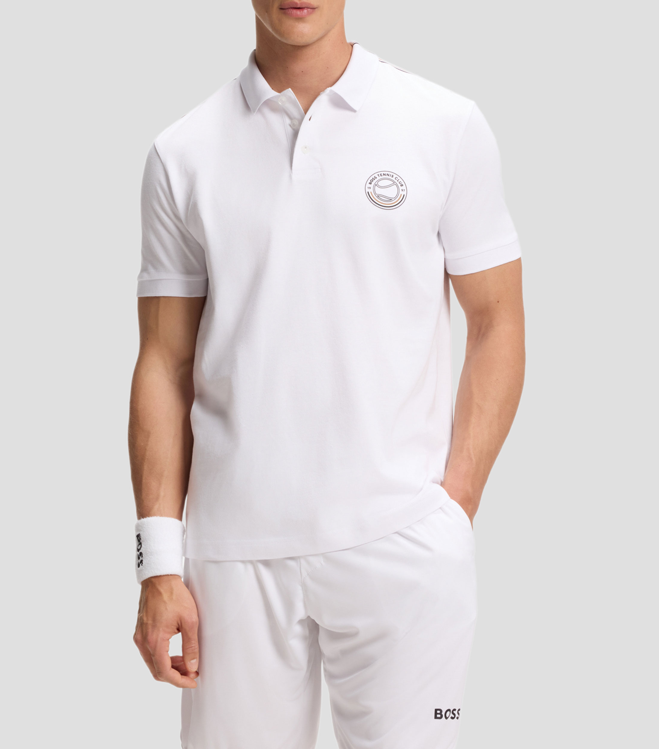 Polo de algodón elástico con un logo inspirado en el tenis Hombre