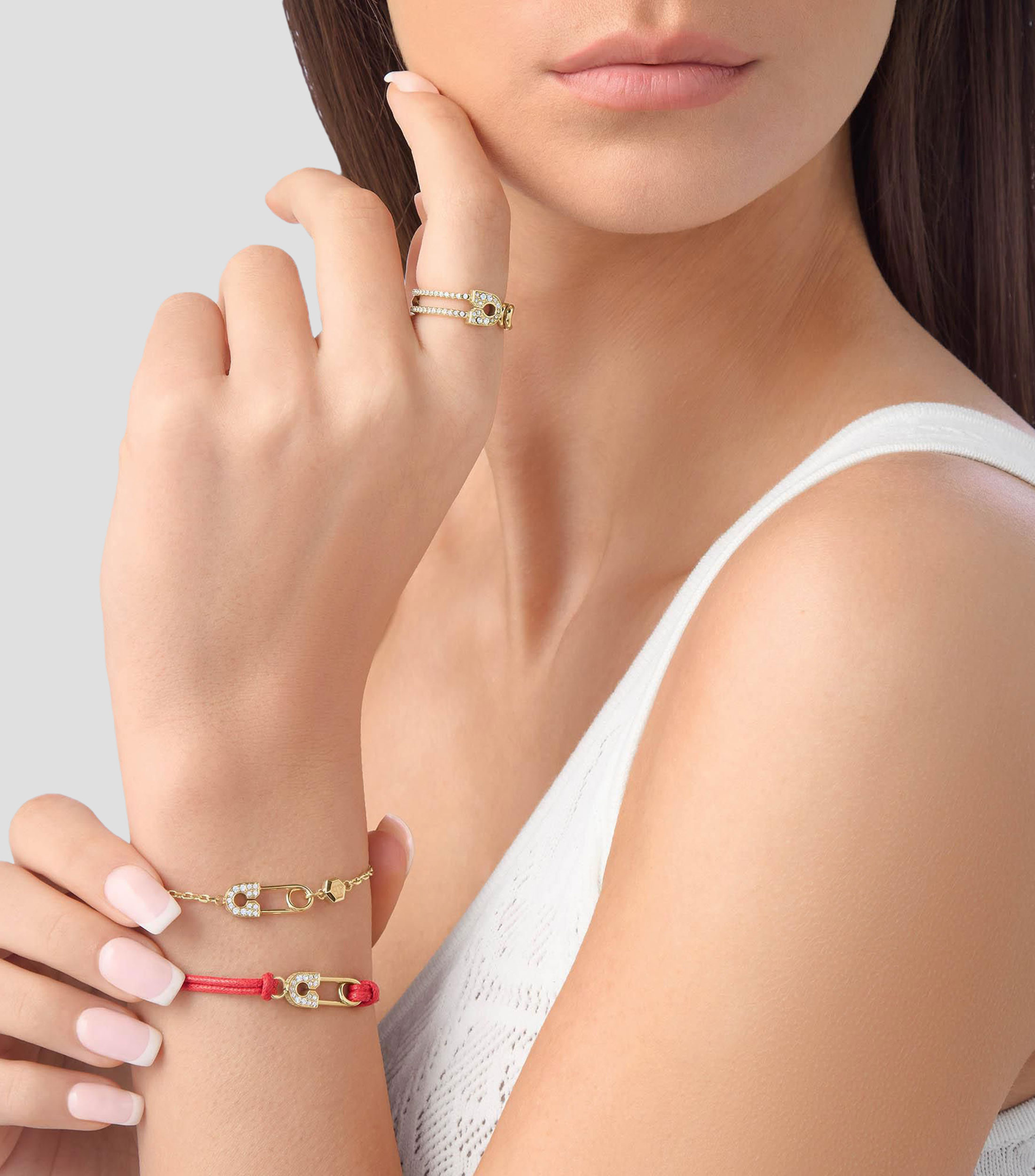 Brazalete con dije de seguro Mujer