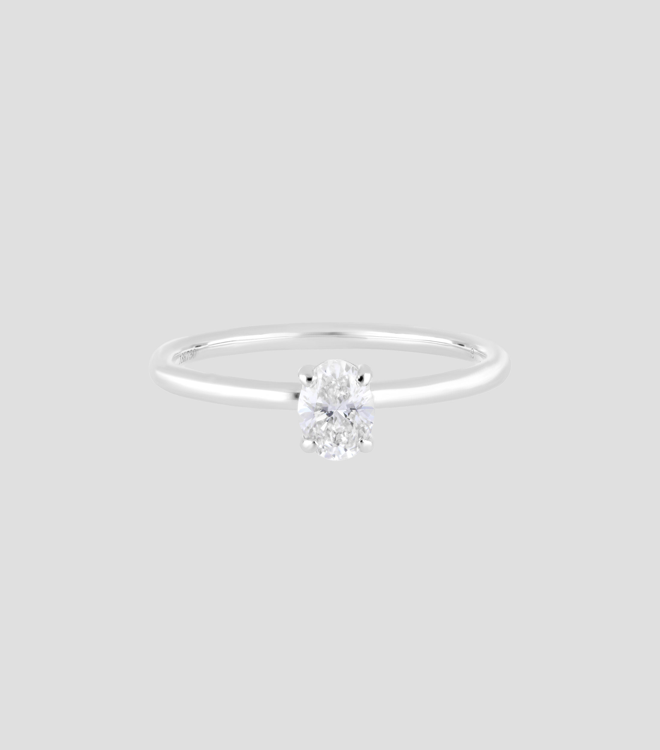 Anillo solitario en oro blanco 18 Kts con diamante Mujer