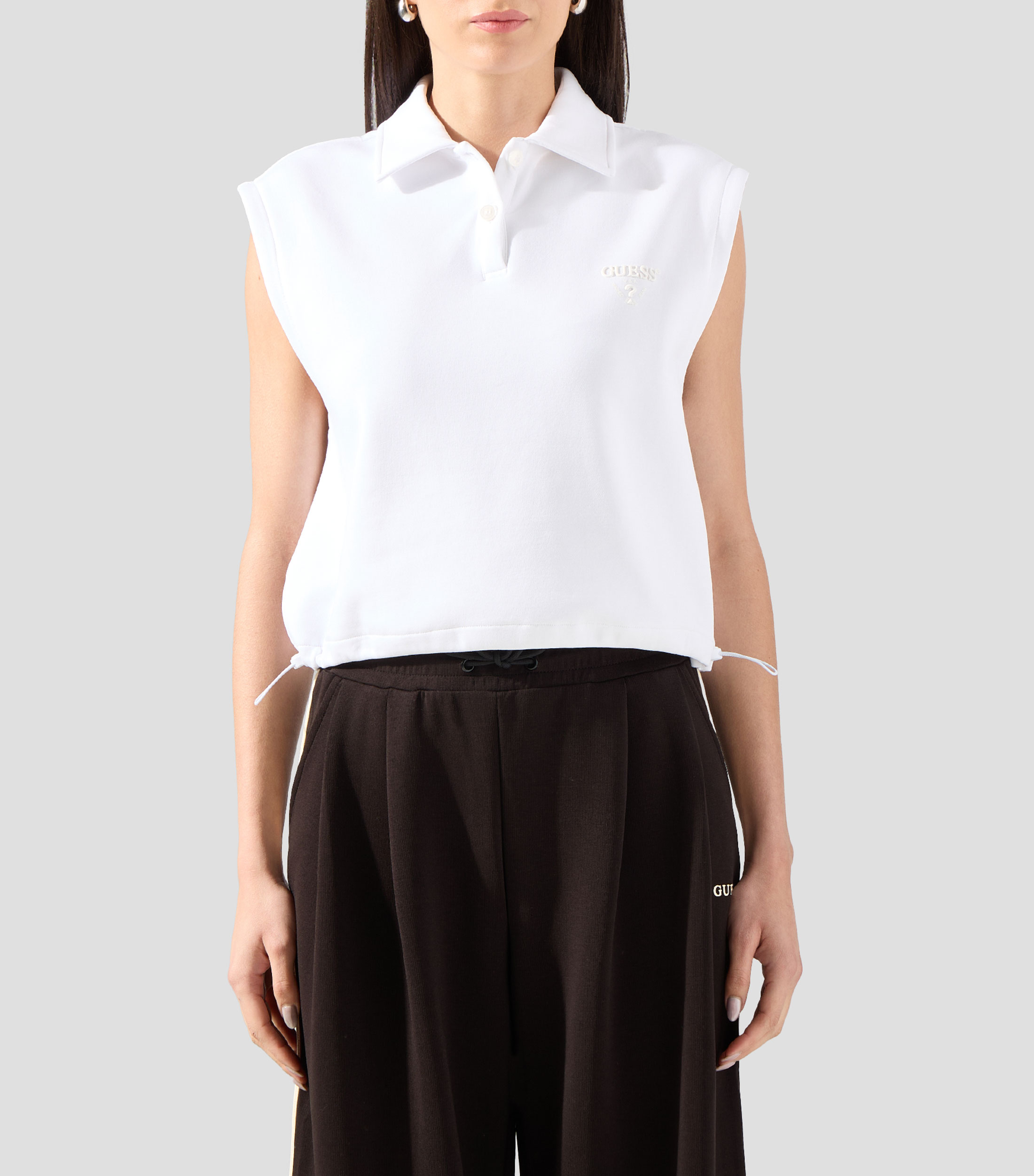 Playera polo sin mangas lisa Mujer