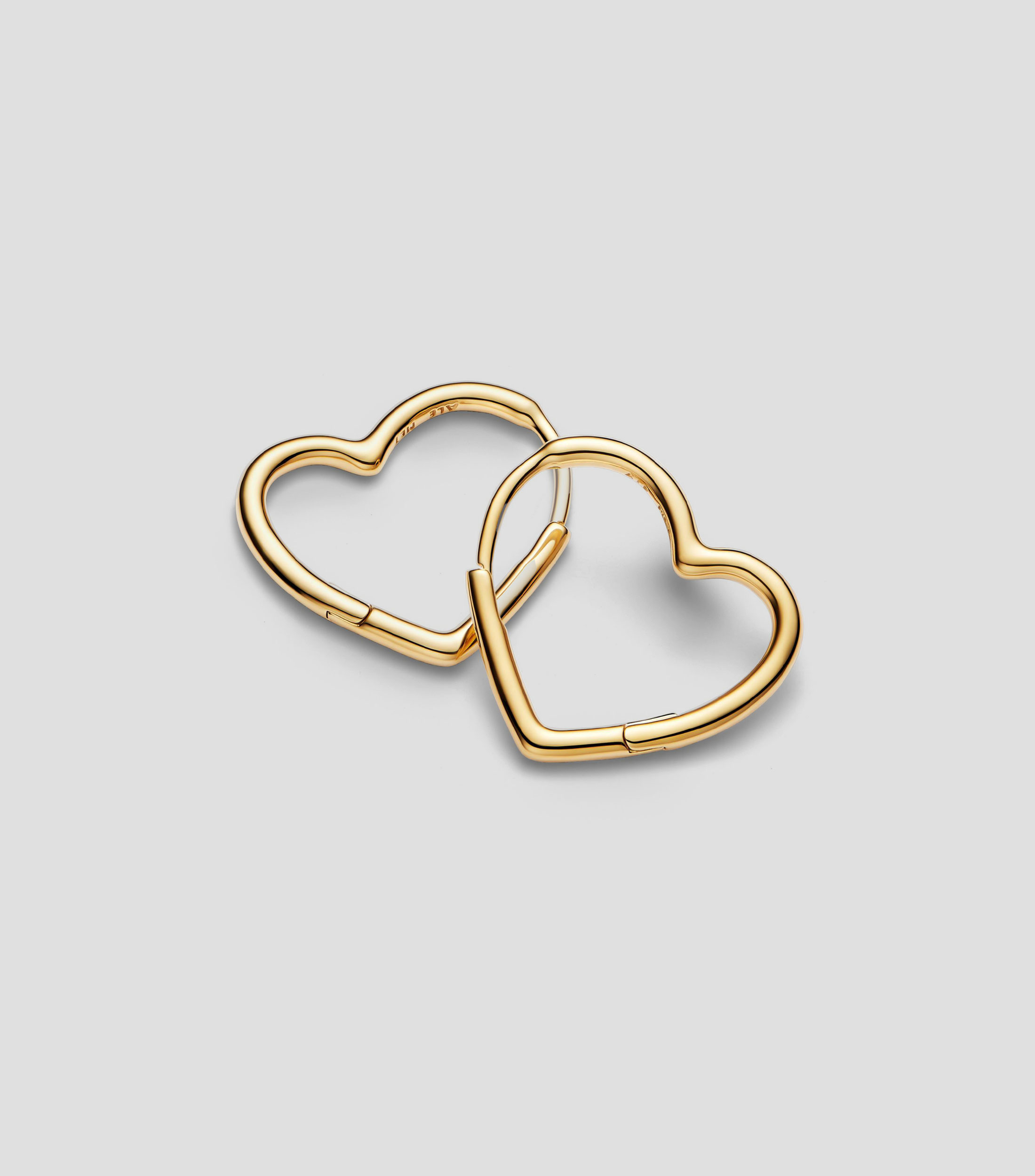 Aretes de Corazón Asimétrico Mujer