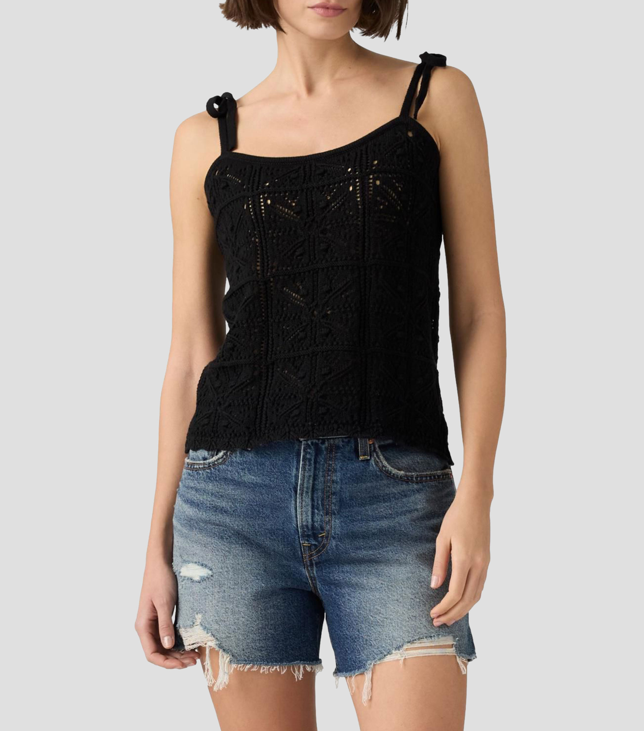 Blusa lisa sin mangas Mujer