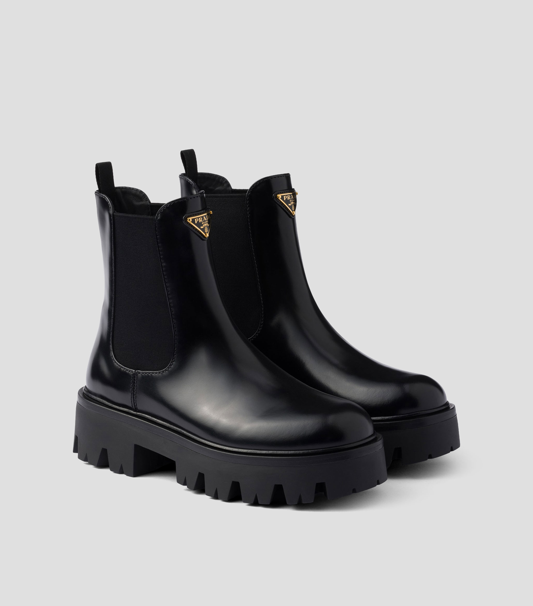 Botines casuales en piel con tacón medio y ancho Mujer