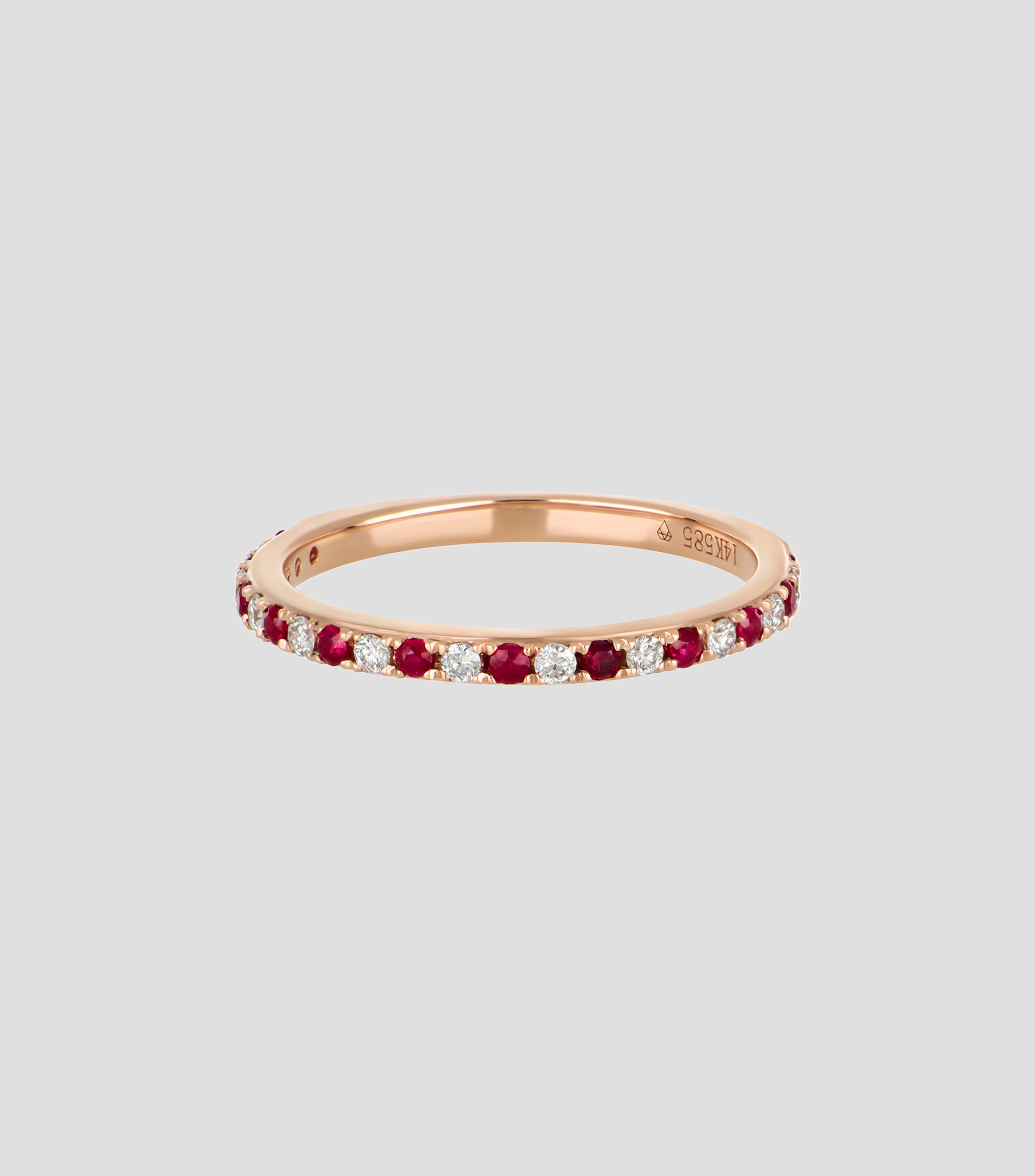Anillo en Oro rosa de 14 Kilates con rubís y diamantes Mujer