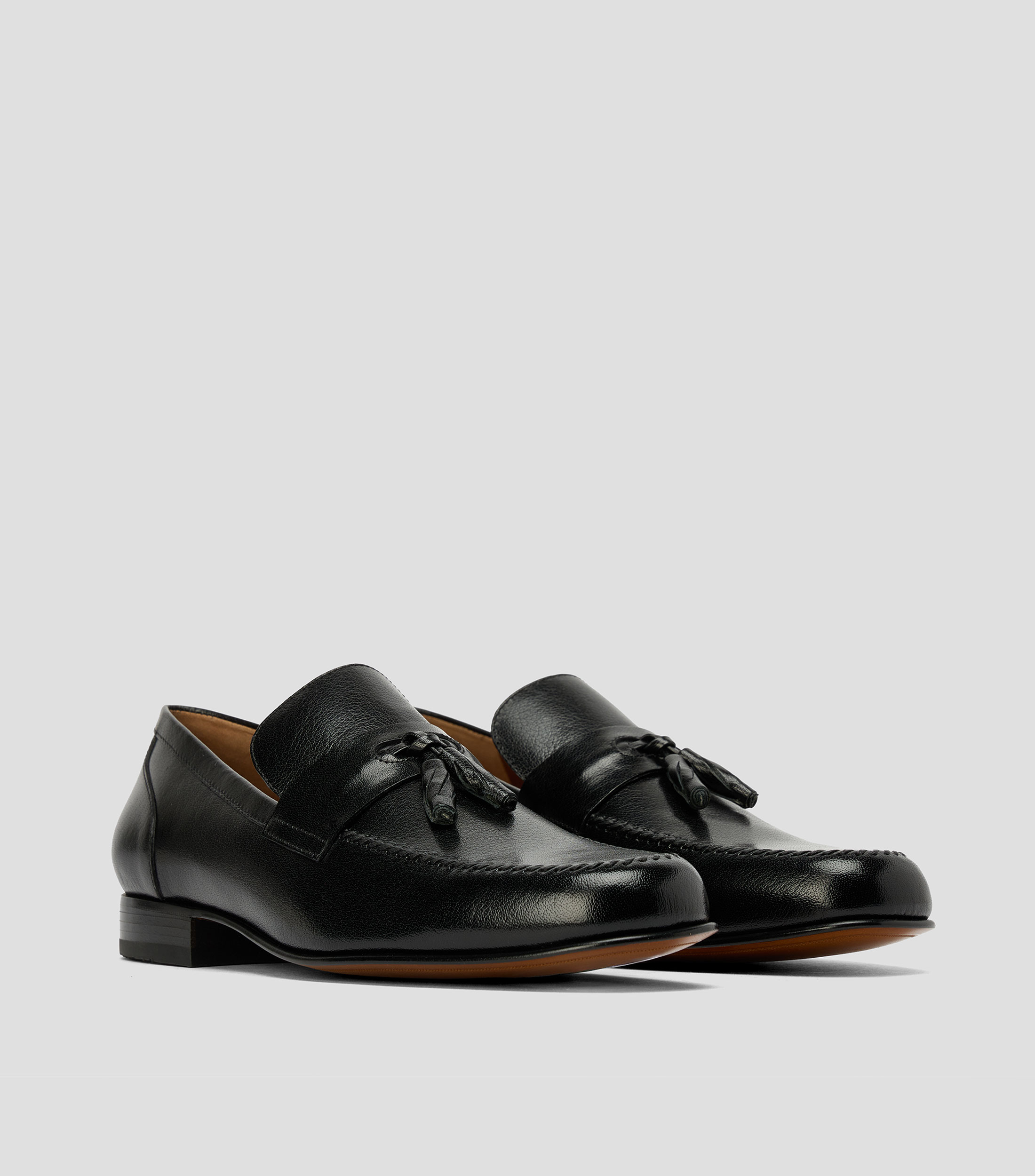 Mocasines en piel con flequillos Hombre