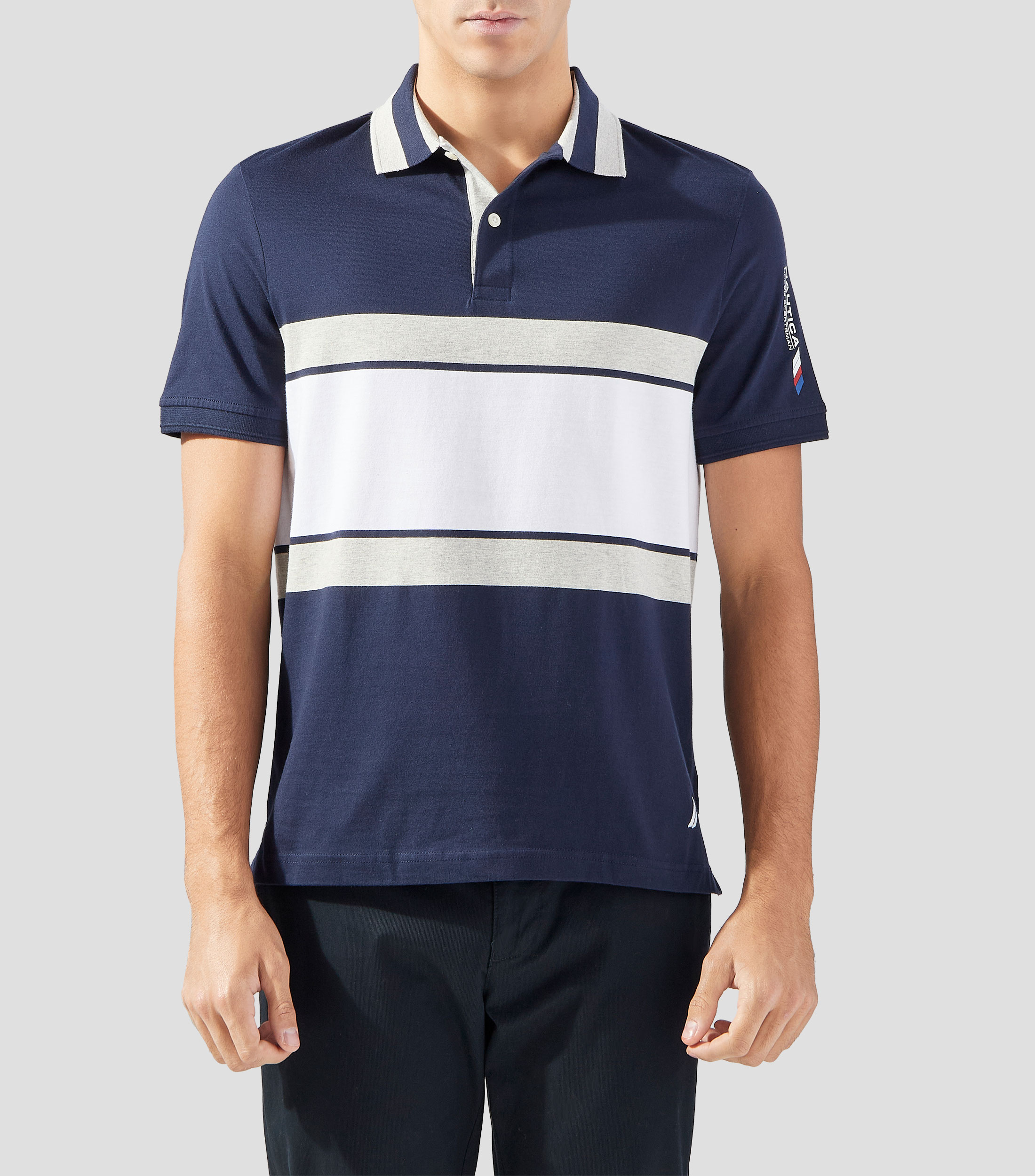 Playera tipo polo de manga corta con rayas Hombre