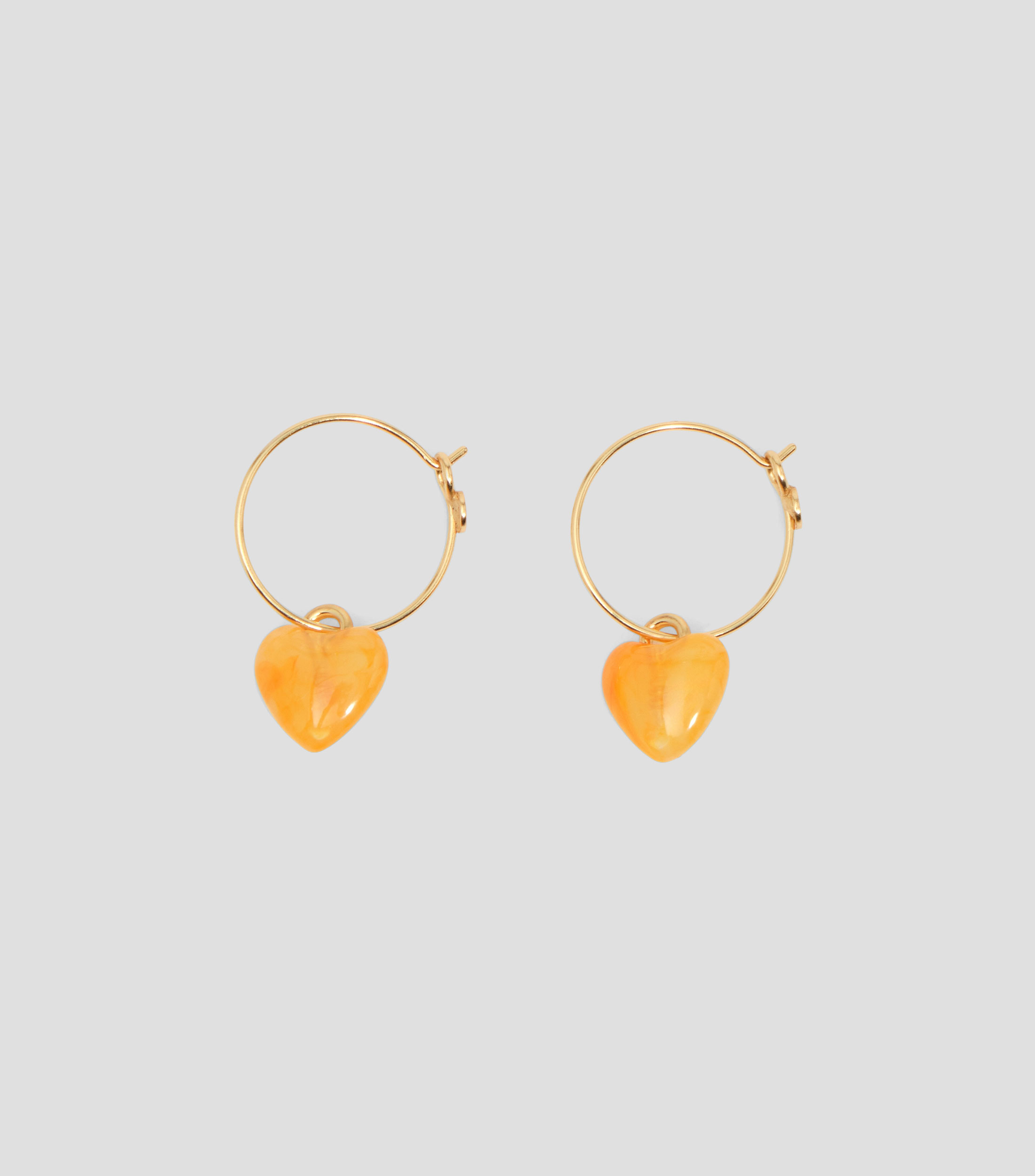 Aretes en forma de corazón Mujer