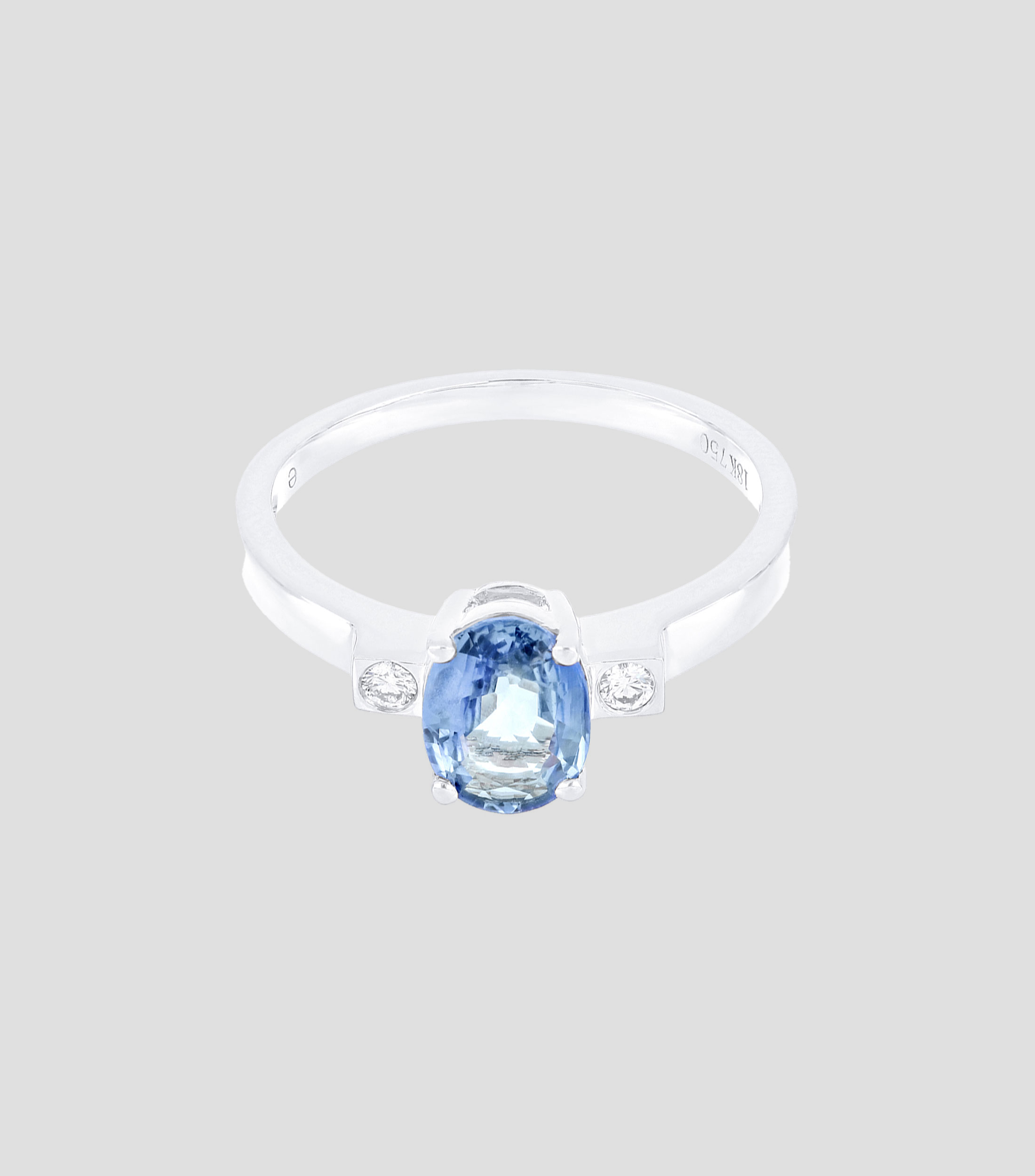 Anillo en oro blanco de 18 Kilates con zafiro Mujer