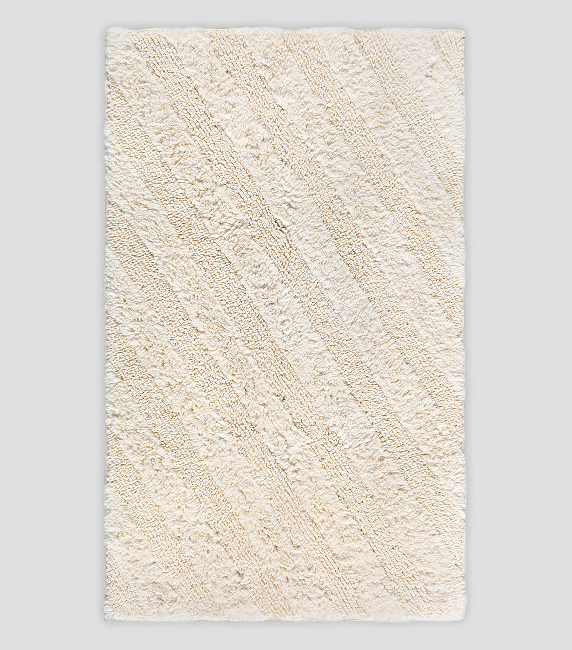 Tapete de baño Tufted hueso