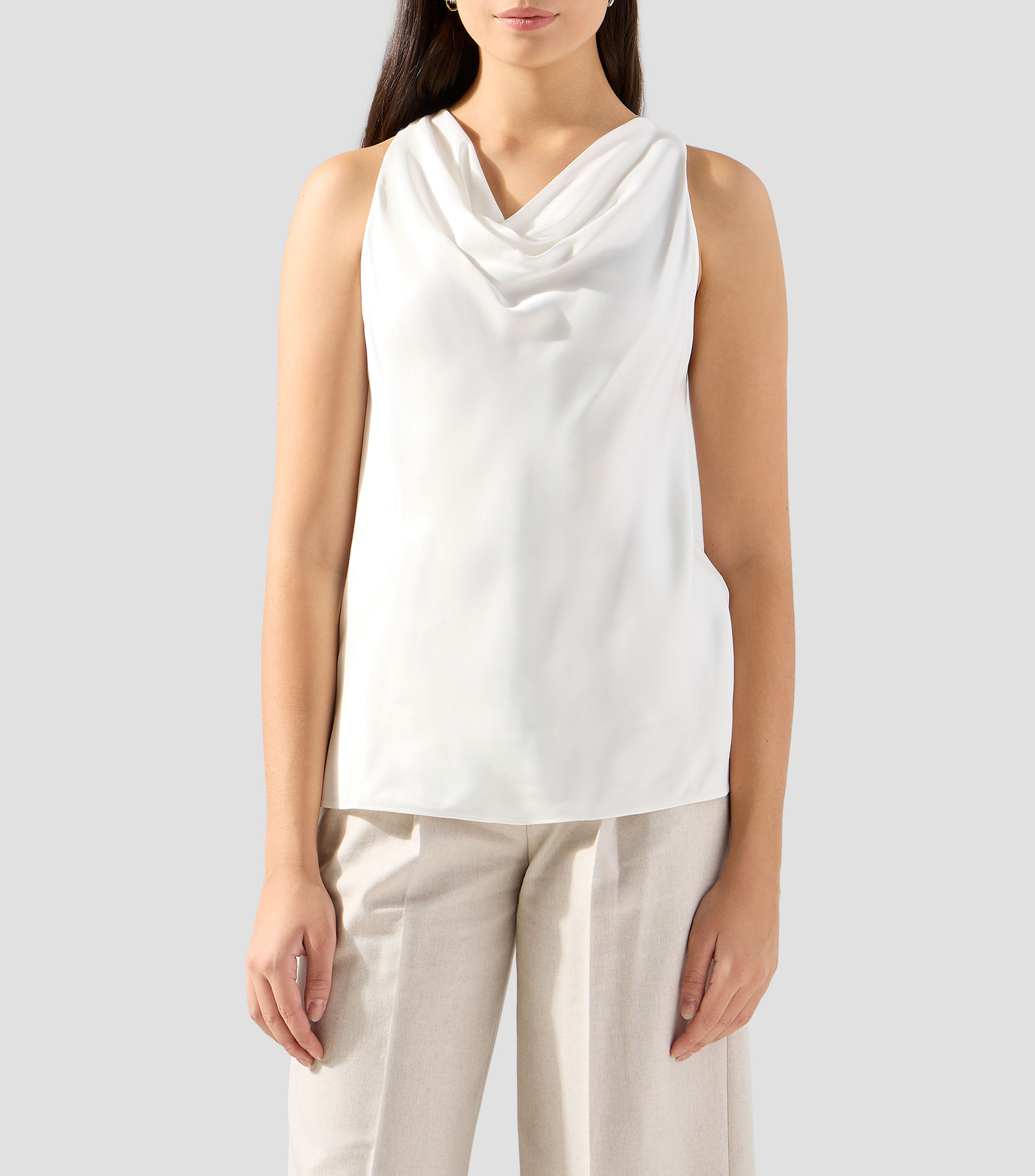 Blusa lisa sin mangas Mujer