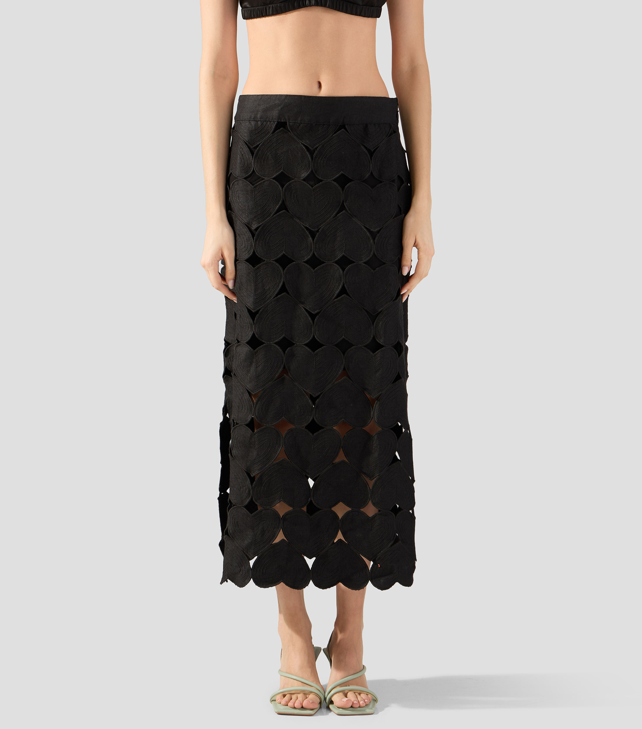 Falda midi de corte recto con calados lisa Mujer